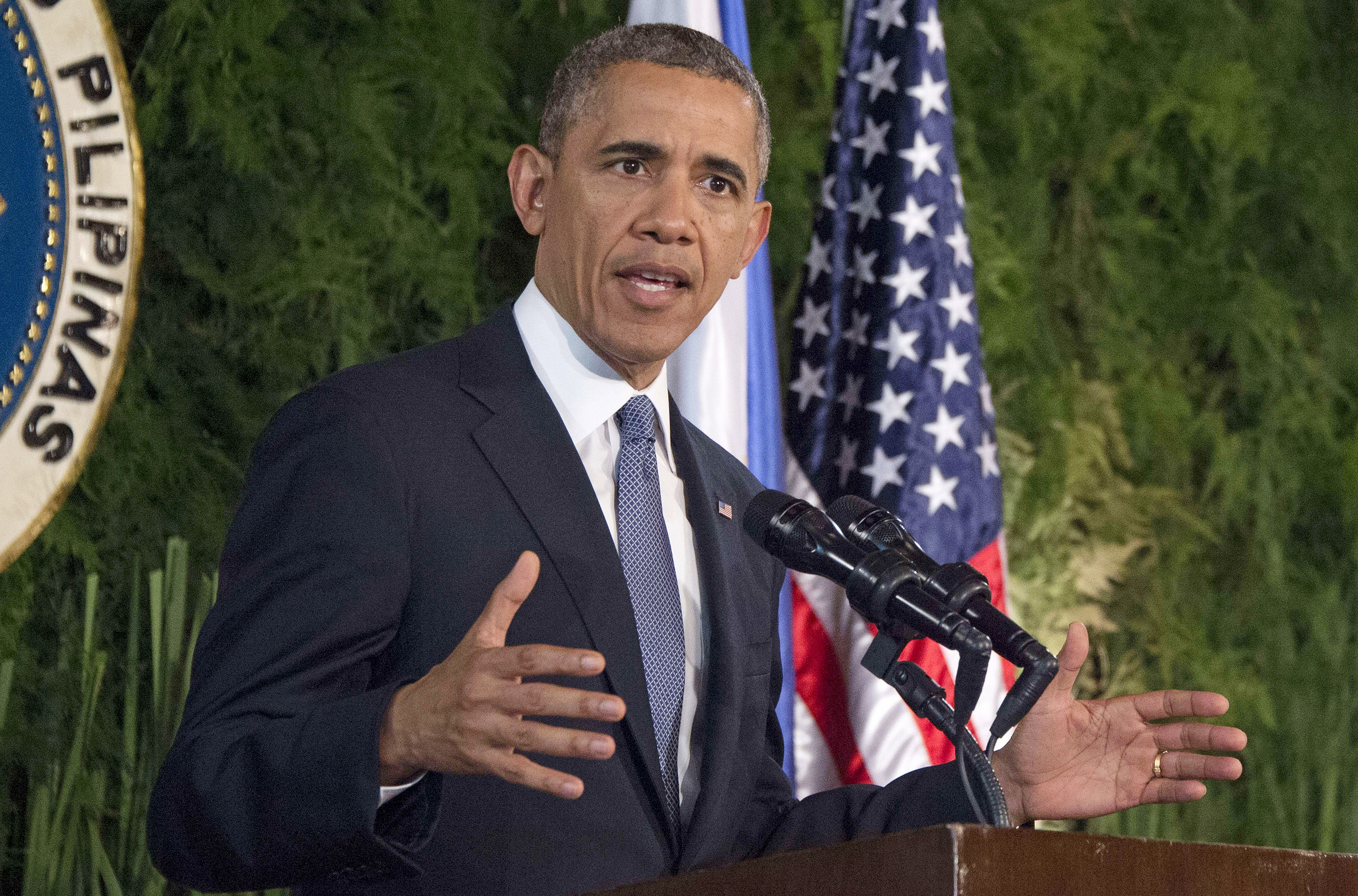 U.S. President Barack Obama speaks during a bilateral press conference with the Philippines President Benigo Aquino at Malacanang Palace in Manila on April 28, 2014.