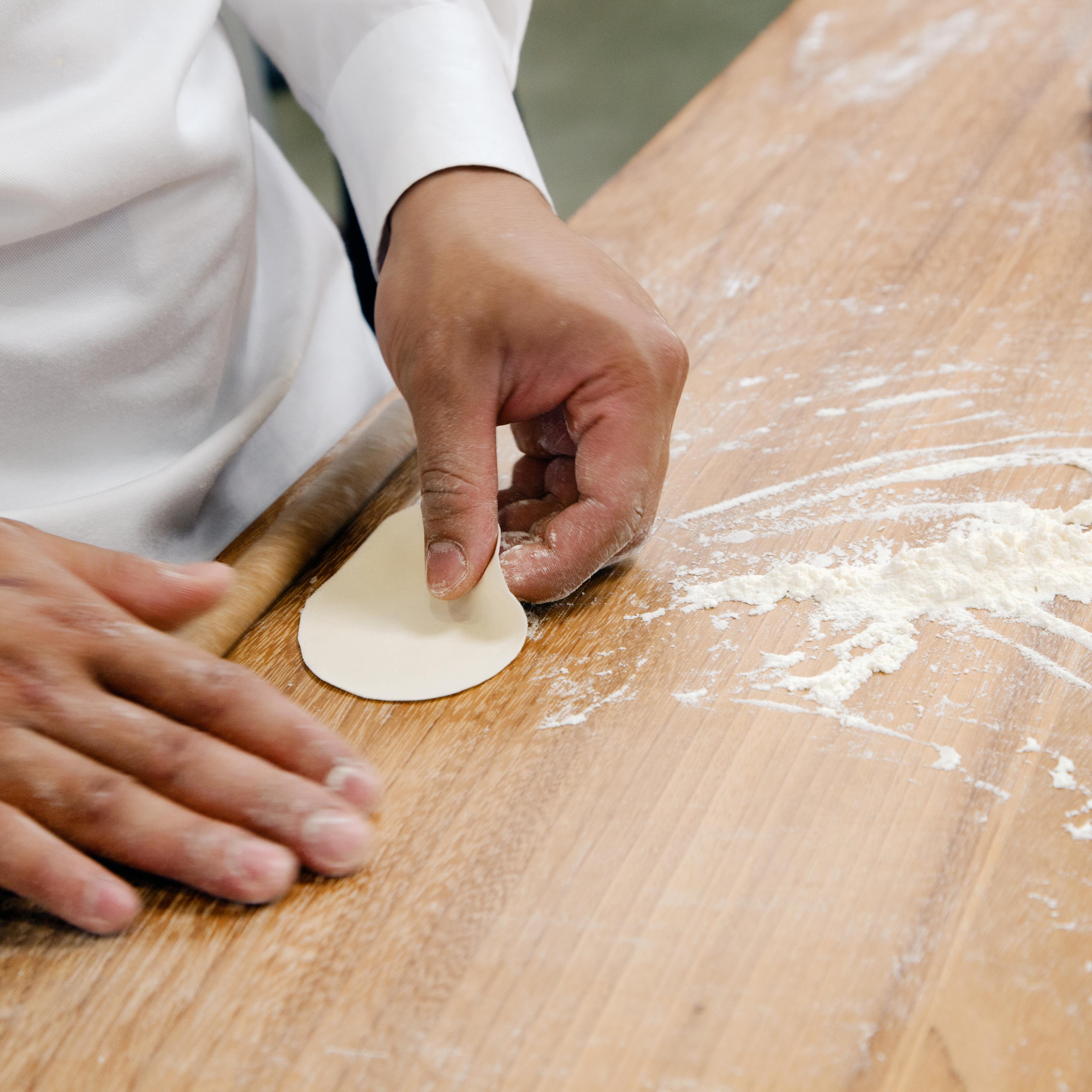 artisan kneading bread