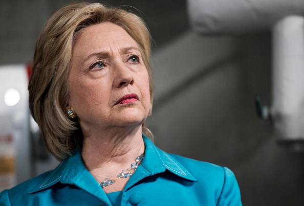 Secretary Hillary Clinton tours the DART Central Station, before taking questions from journalists, to highlight her climate change policy announcement, in Des Moines, Iowa on Monday, July 27, 2015.
