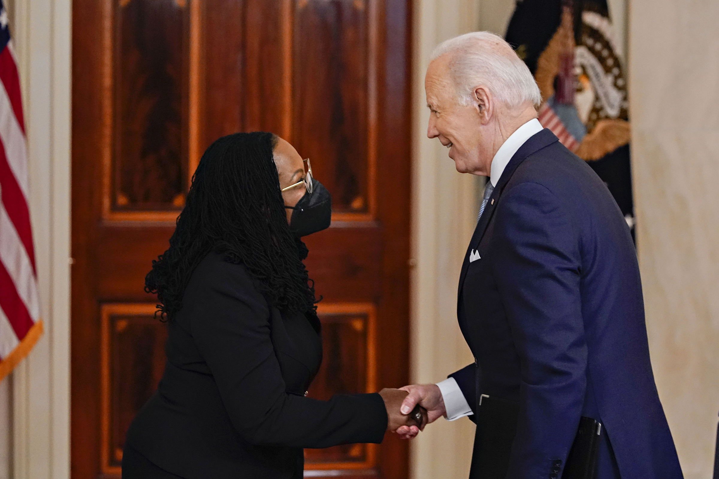 President Joe Biden and Ketanji Brown Jackson, nominee for associate justice of the U.S. Supreme Court, shake hands during an announcement ceremony at the White House in Washington, D.C., on Feb. 25, 2022.