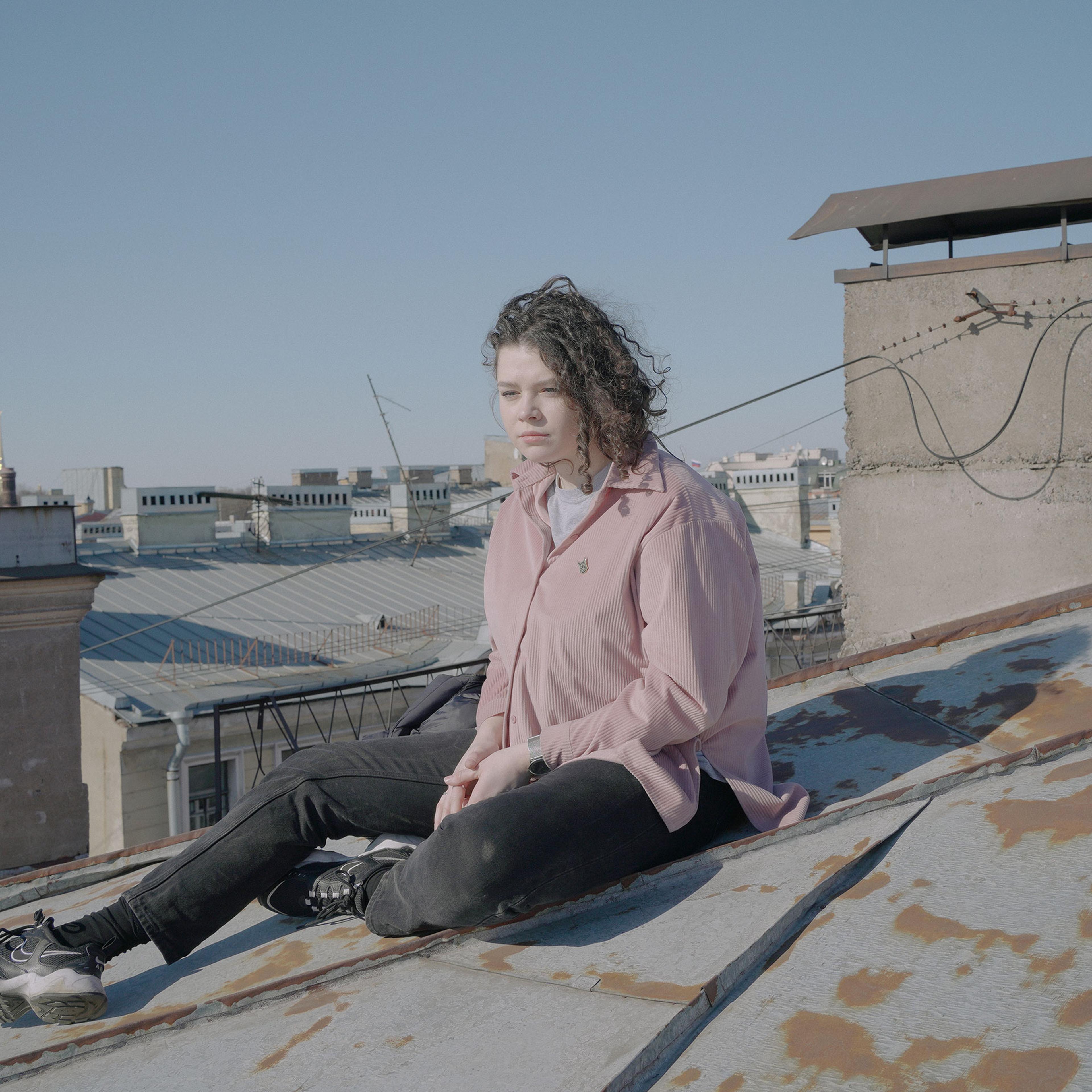 Katya is on the roof in Saint Petersburg, Russia, 18 March 2022Katya was an employee of the cinema networks "Moskino", she managed two Moscow cinemas. She was fired because she signed an open letter from cultural workers against the «special military ope