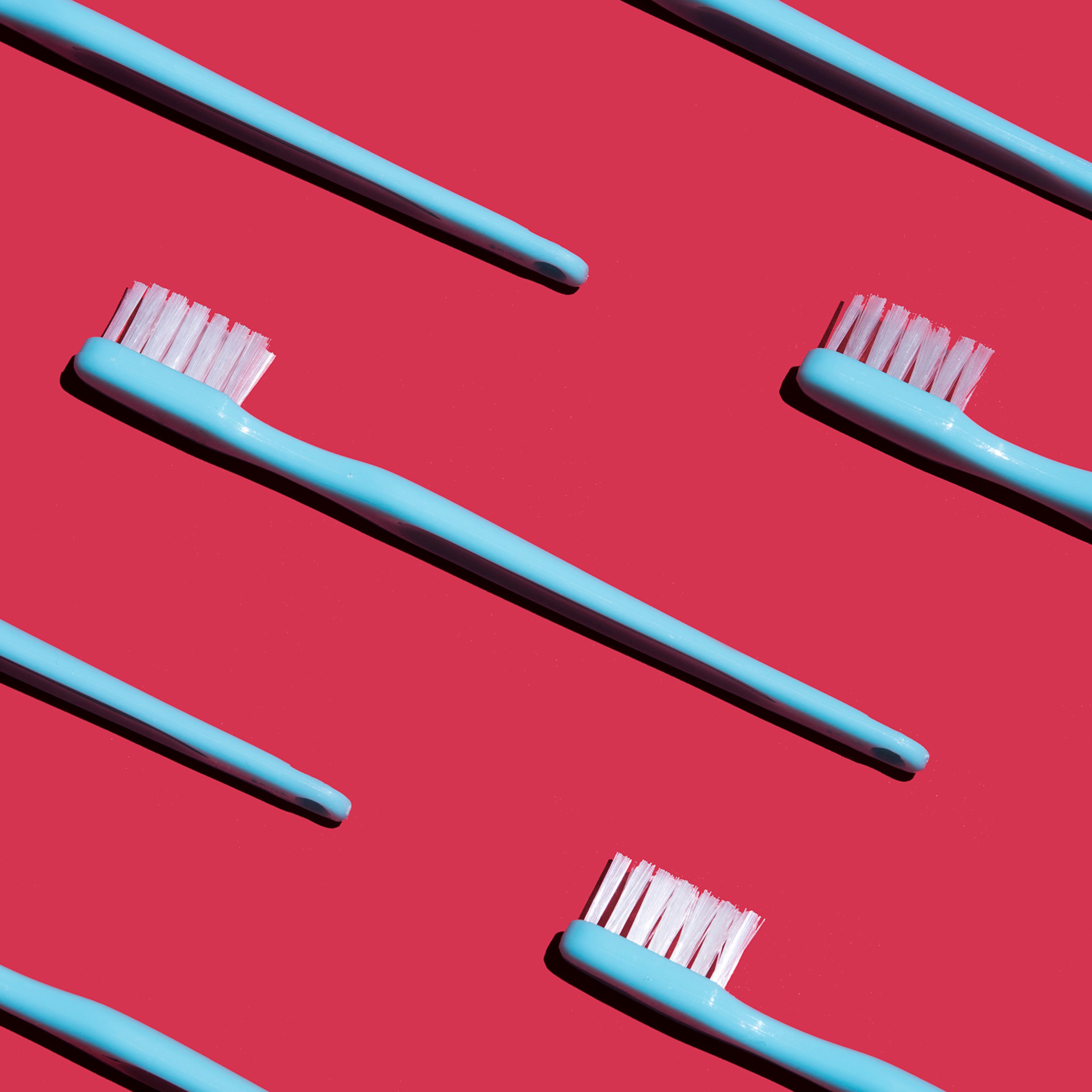 toothbrushes-health-clean-home-daily-routine-motto-stock