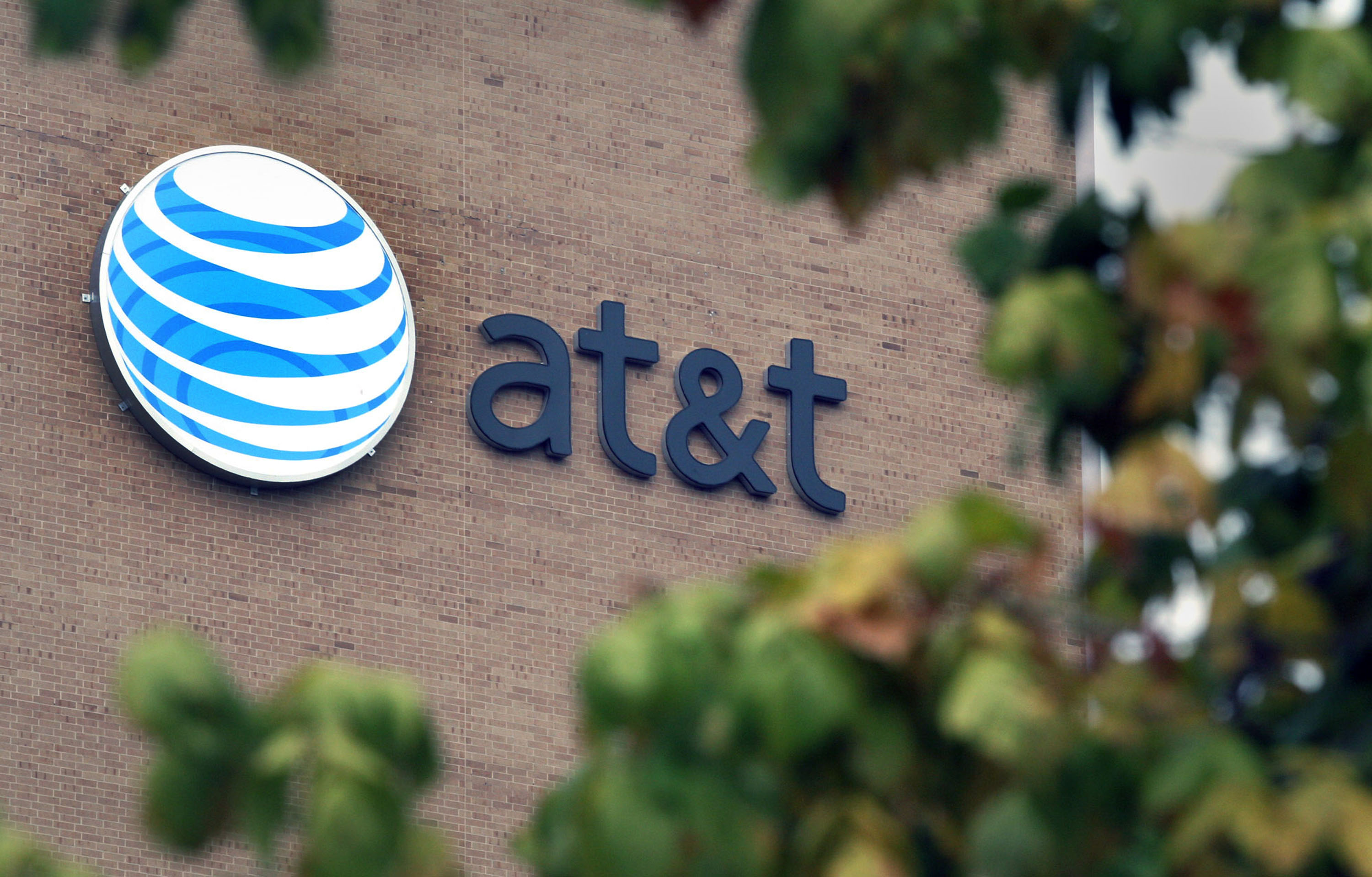 The AT&T logo is seen on the company's headquarters in San Antonio, Texas on Oct. 12, 2006.