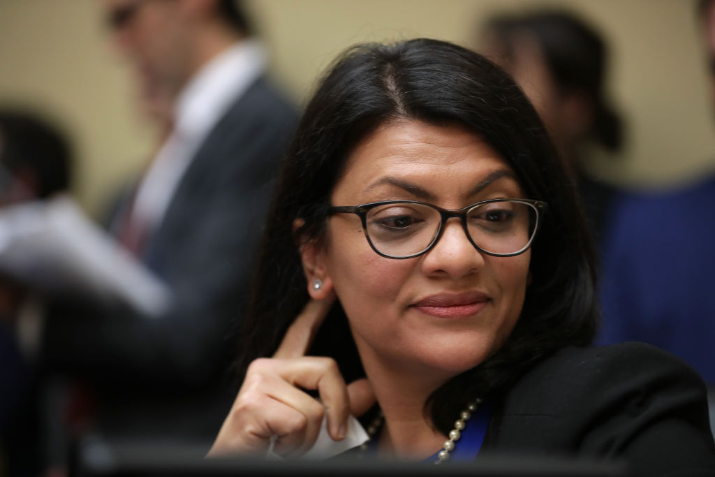Rep. Rashida Tlaib listens to Michael Cohen testify