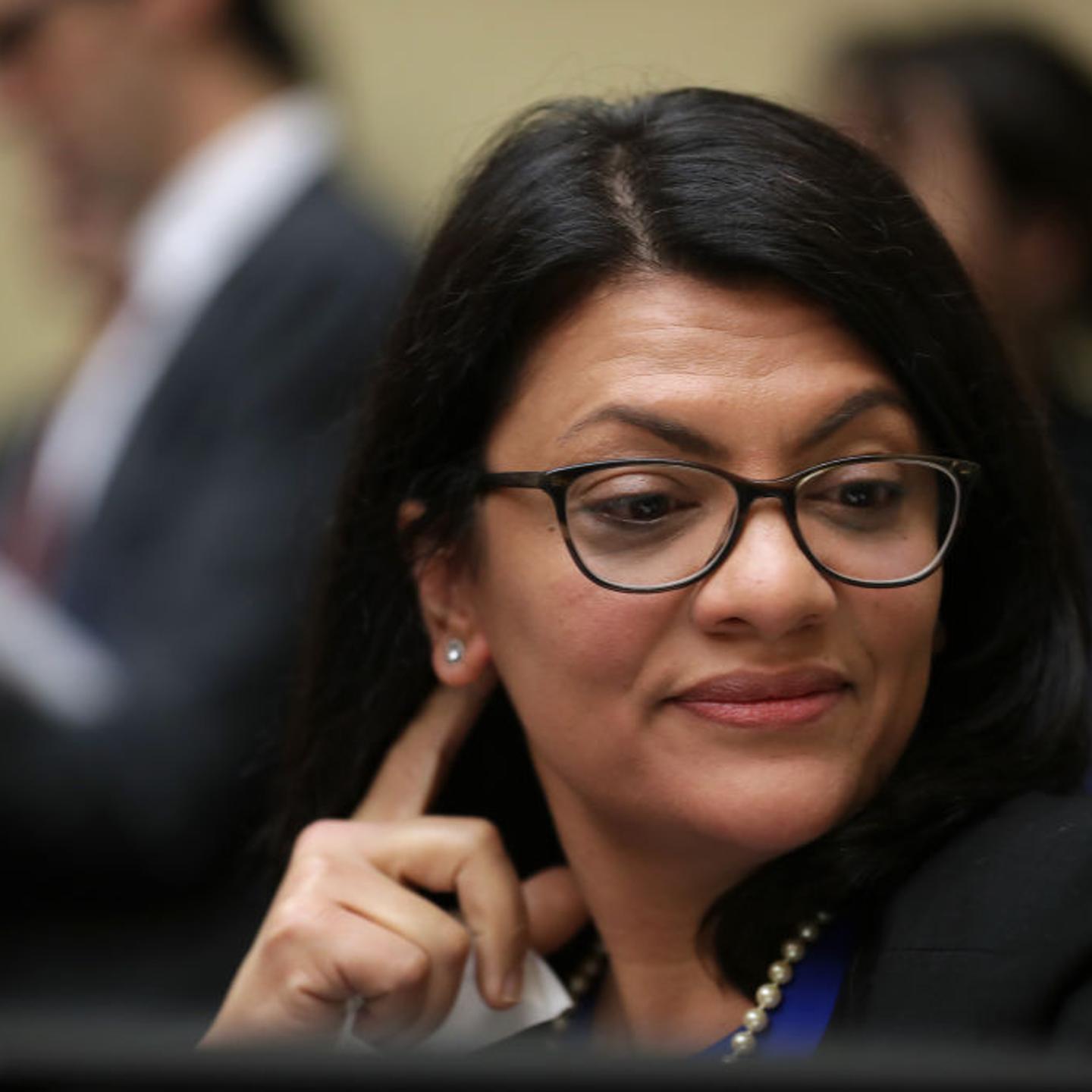 Rep. Rashida Tlaib listens to Michael Cohen testify