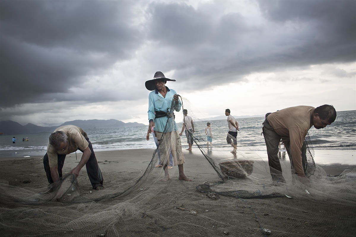 Fishermen at work on a beach outside Banda Aceh, Indonesia, on Nov. 17, 2014 