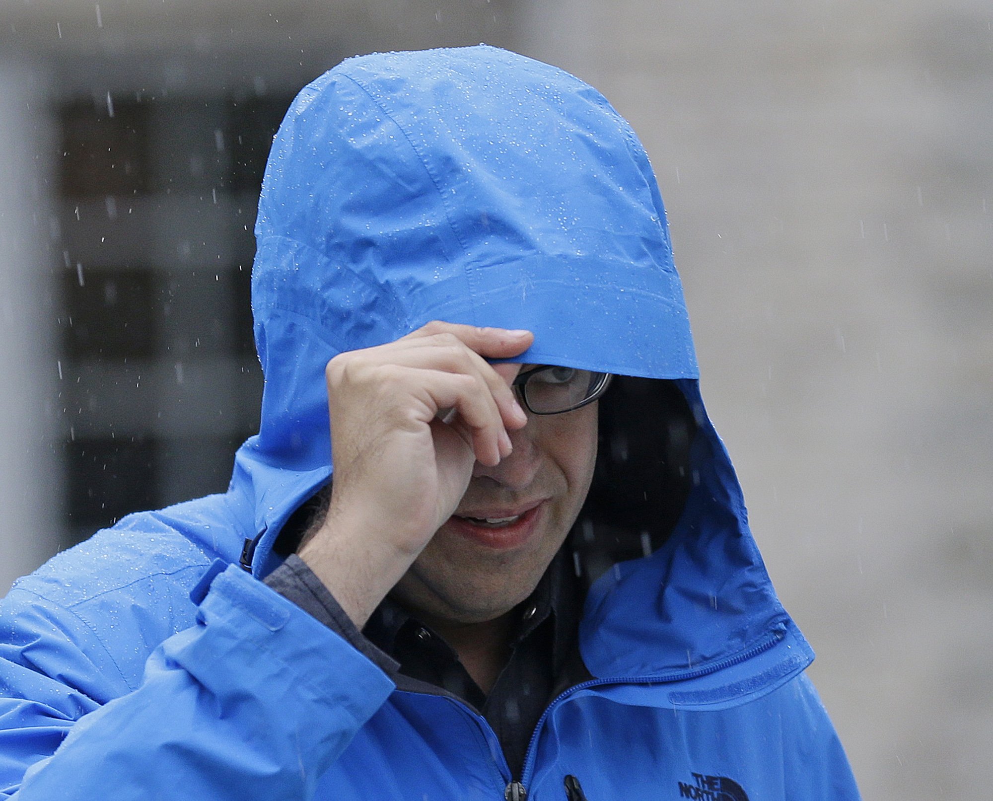 Subway restaurant spokesman Jared Fogle walks to a waiting car as he leaves his home on July 7, 2015, in Zionsville, Ind.