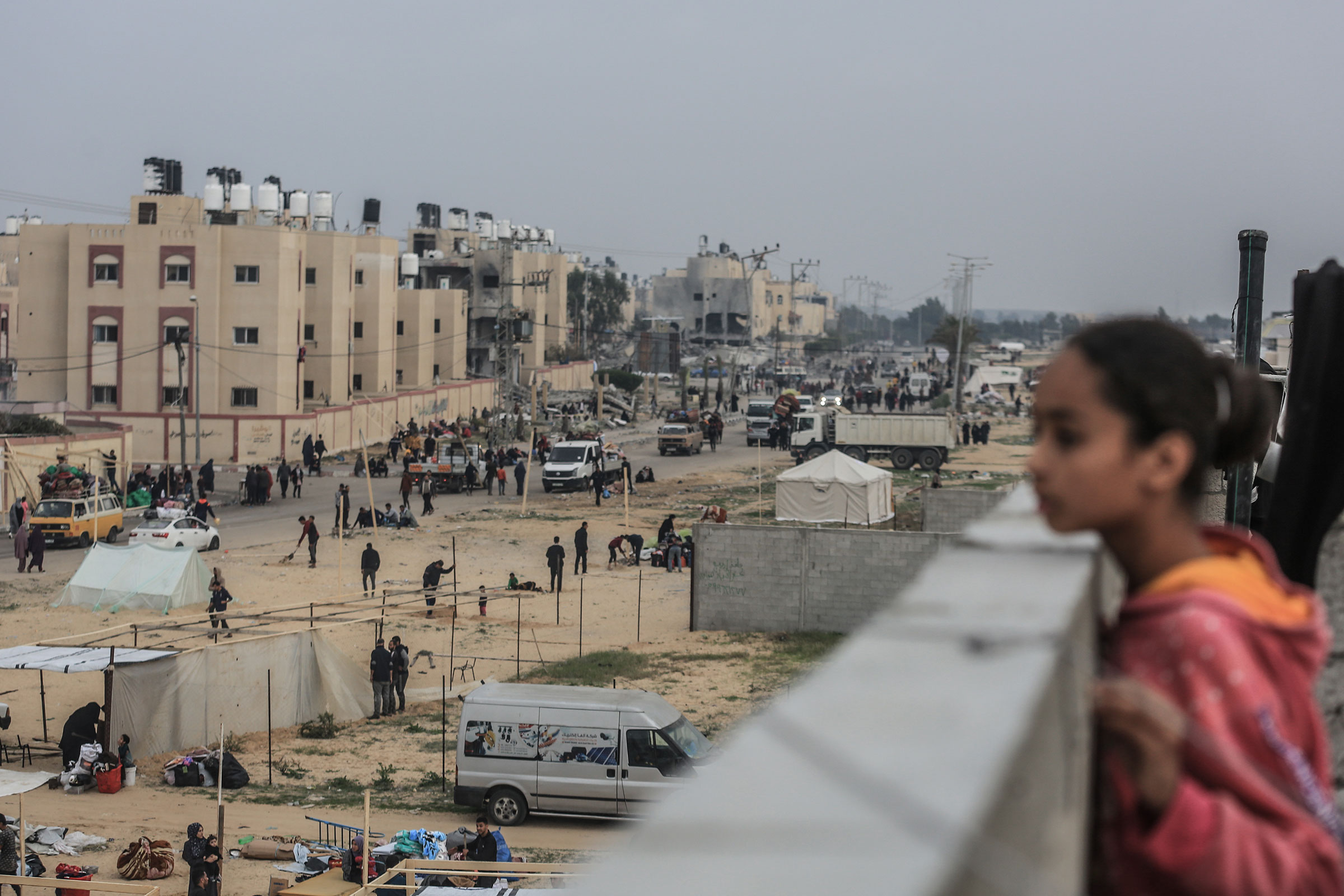 Palestinians set up tents near the Egyptian border in Rafah after fleeing from the city of Khan Yunis in the southern Gaza Strip, on Dec. 5, 2023.
