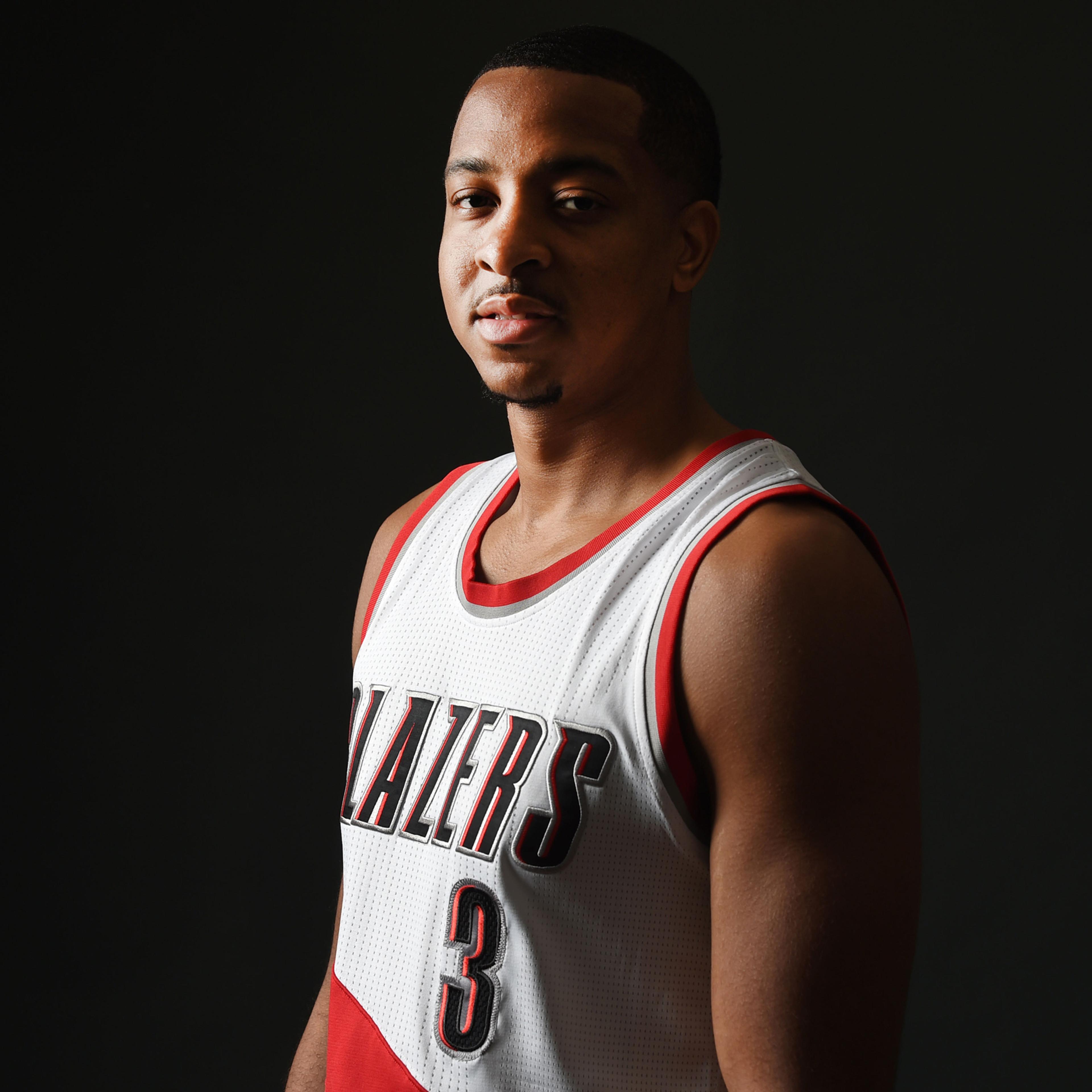 Portland Trail Blazers guard C.J. McCollum (3) poses for a photograph during Portland Trailblazers media day in Portland, Ore., Monday, Sept. 26, 2016. (AP Photo/Steve Dykes)