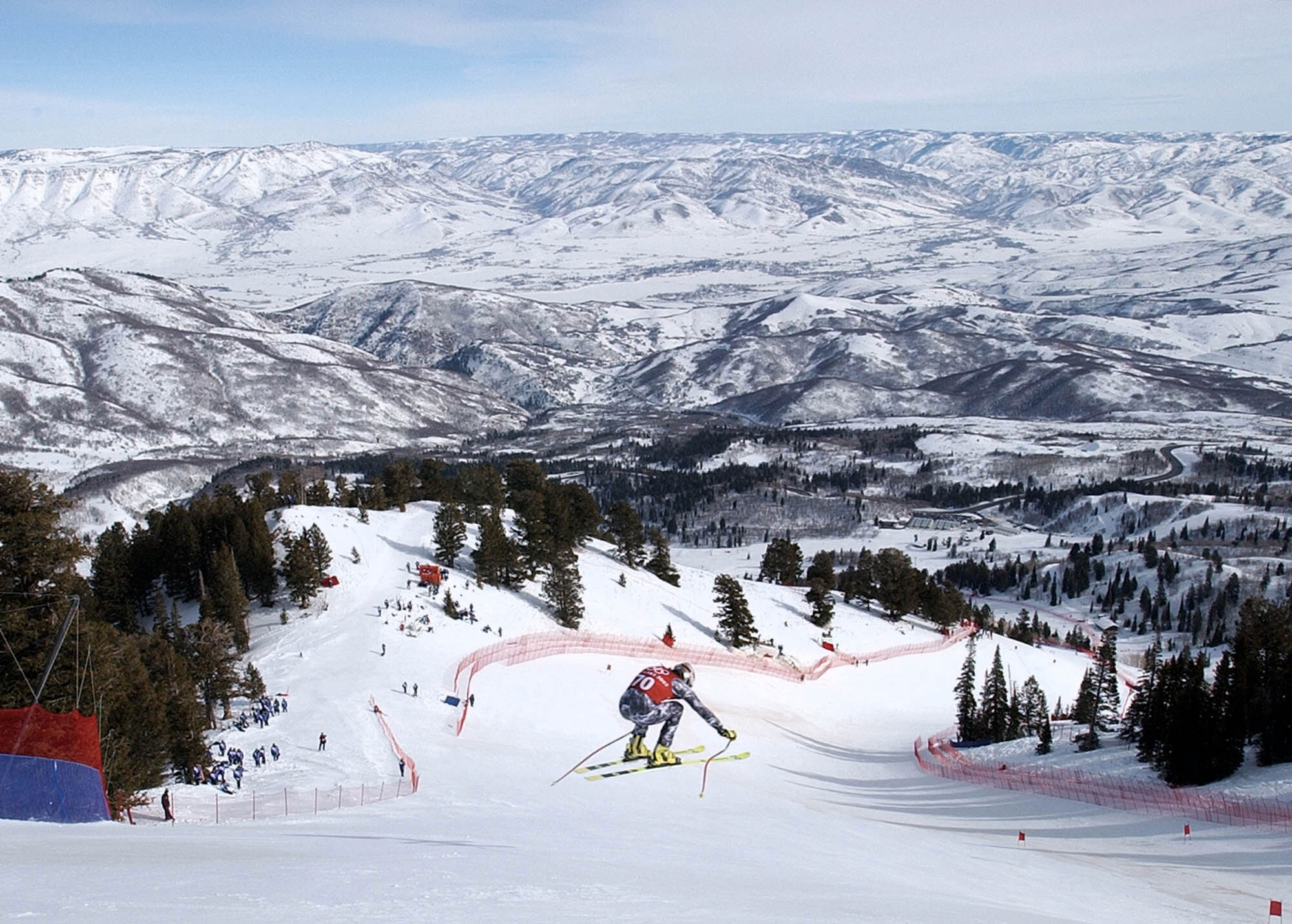 Ireland’s Paul Schwarzacher-Joyce speeds through the air during the first Men’s Downhill training run in Snowbasin, Utah, on Feb. 7, 2002.