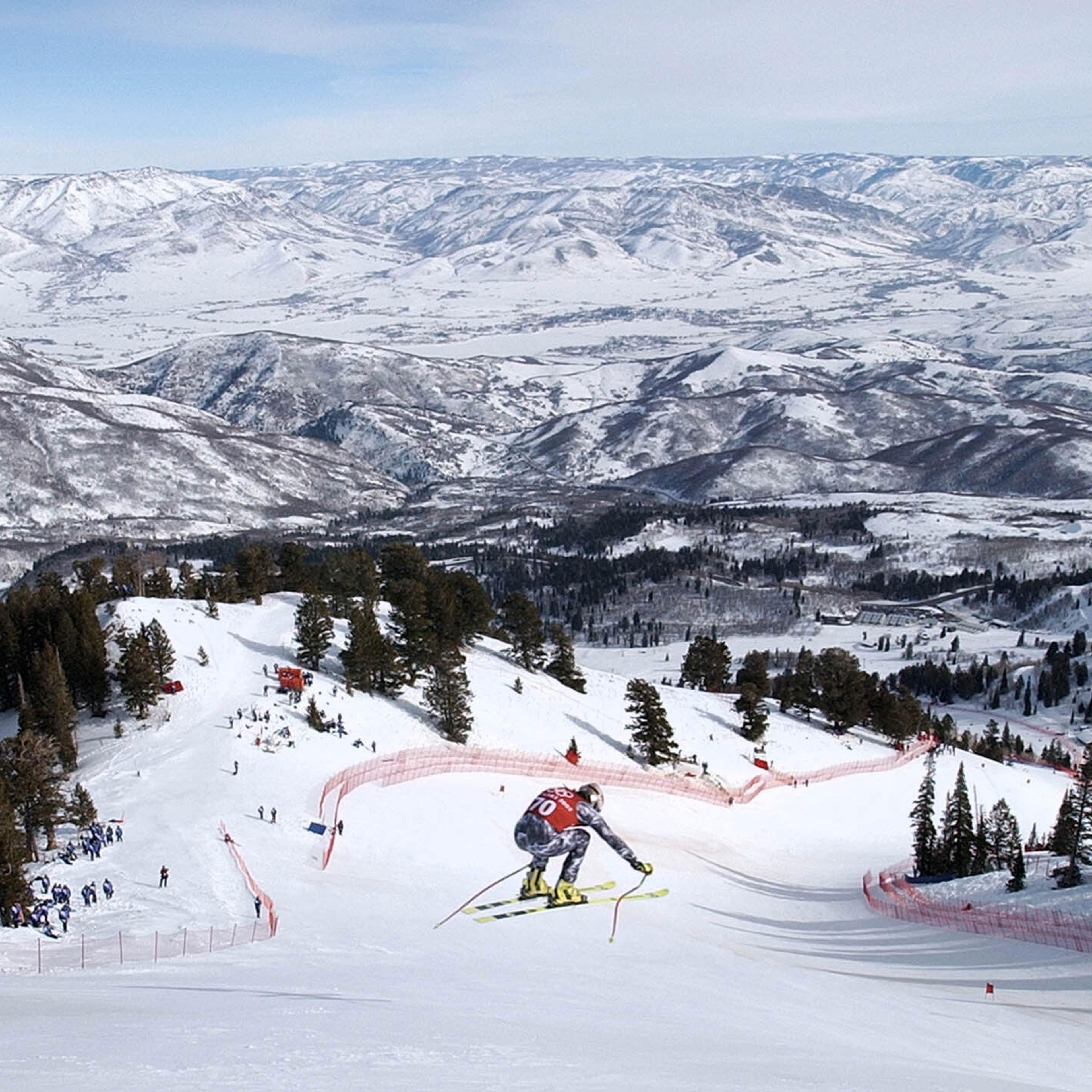 Ireland’s Paul Schwarzacher-Joyce speeds through the air during the first Men’s Downhill training run in Snowbasin, Utah, on Feb. 7, 2002.