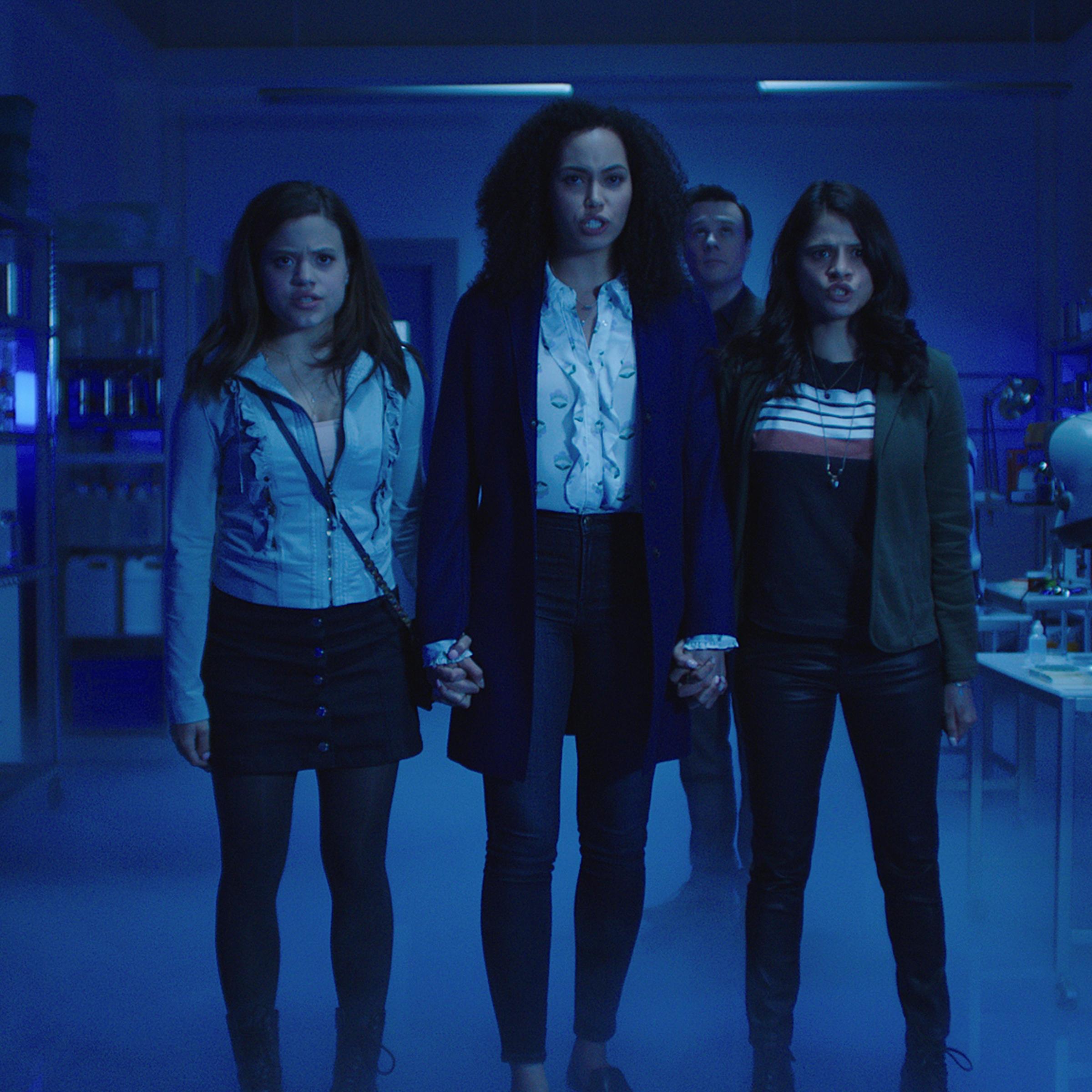 Screen grab from the pilot episode of Charmed. Pictured (L-R): Sarah Jeffery as Maggie Vera, Madeleine Mantock as Macy Vaughn, Rupert Evans as Harry Greenwood and Melonie Diaz as Mel Vera