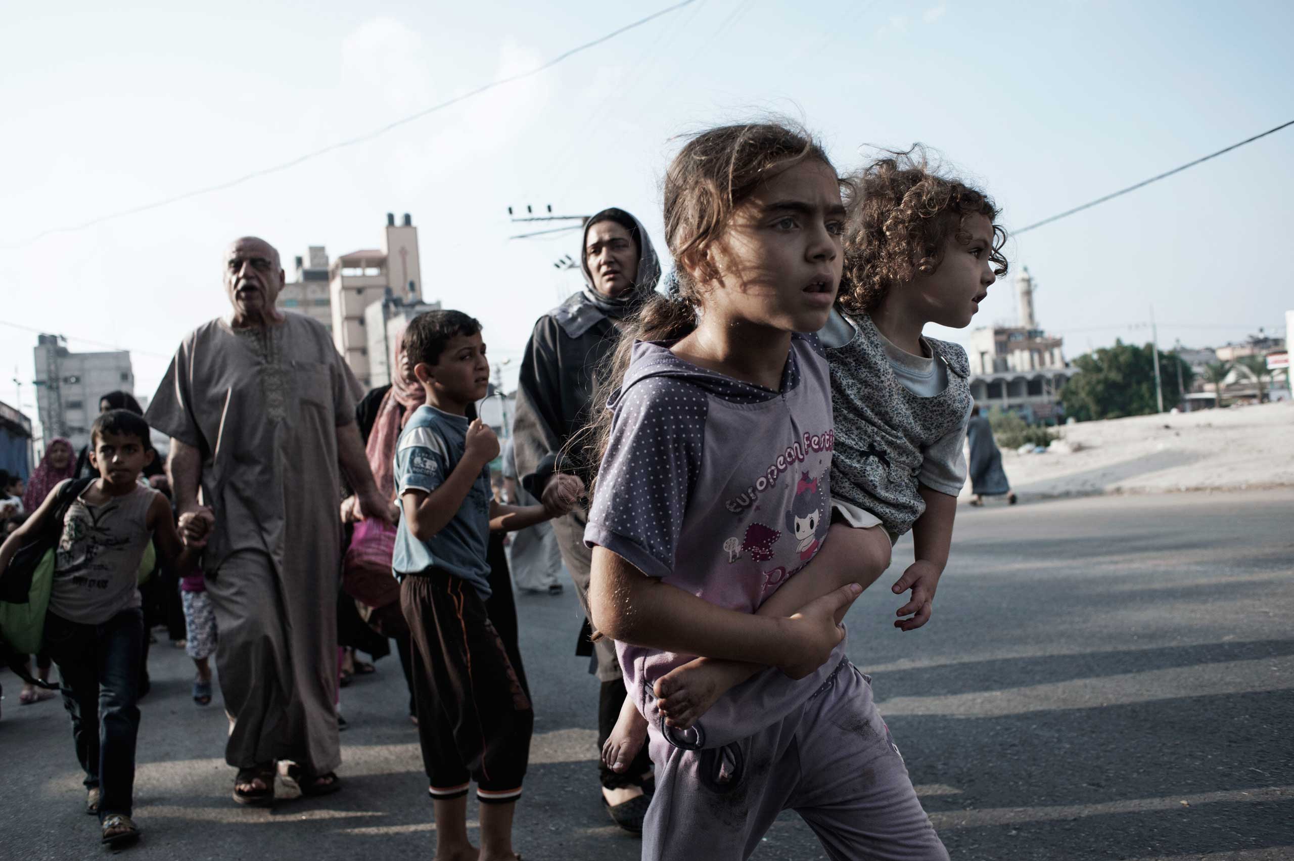 Innocents in the Crossfire: Alessio Romenzi's Shocking Photographs From ...