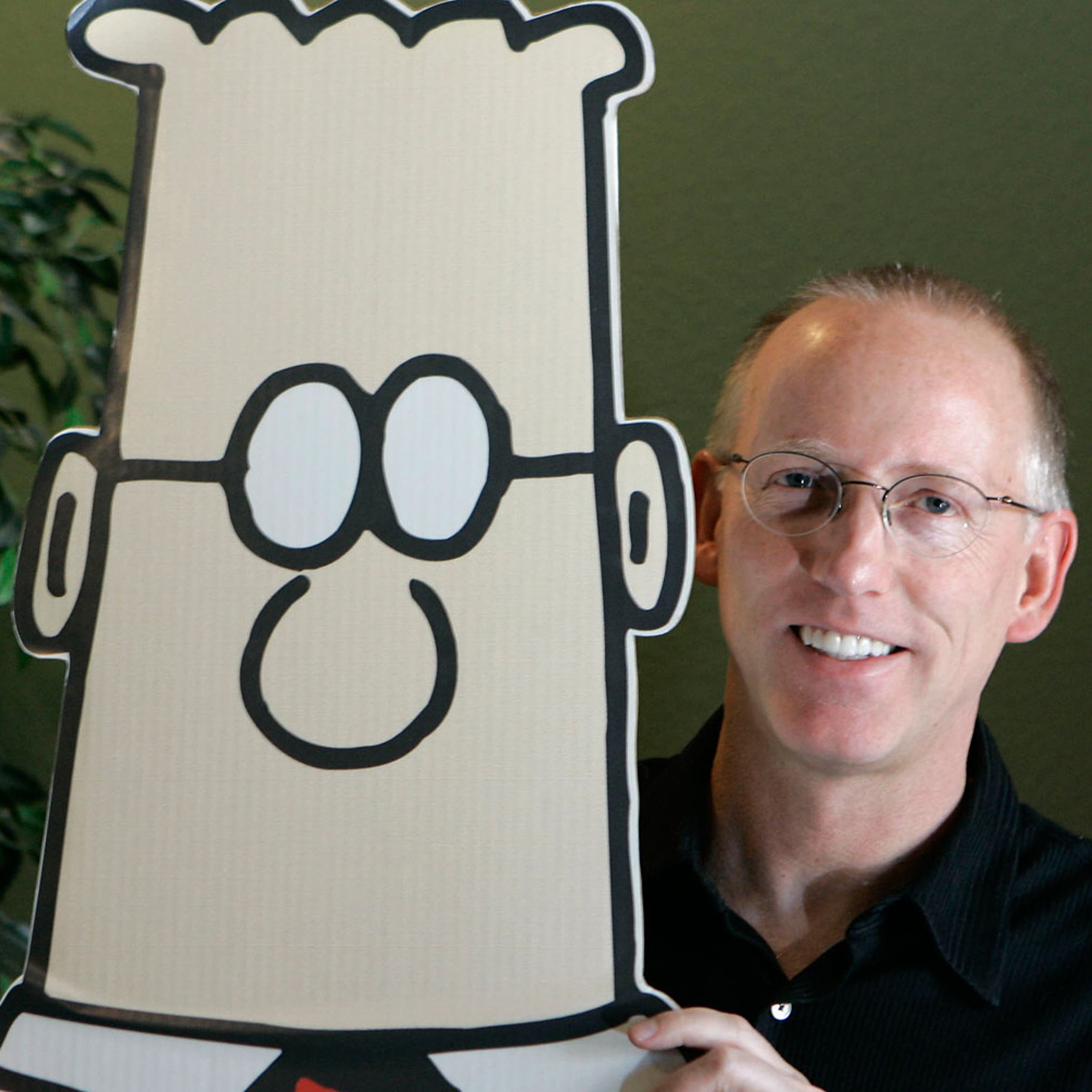 Scott Adams, creator of the comic strip Dilbert, poses for a portrait with the Dilbert character in his studio in Dublin, Calif., Thursday, Oct. 26, 2006.