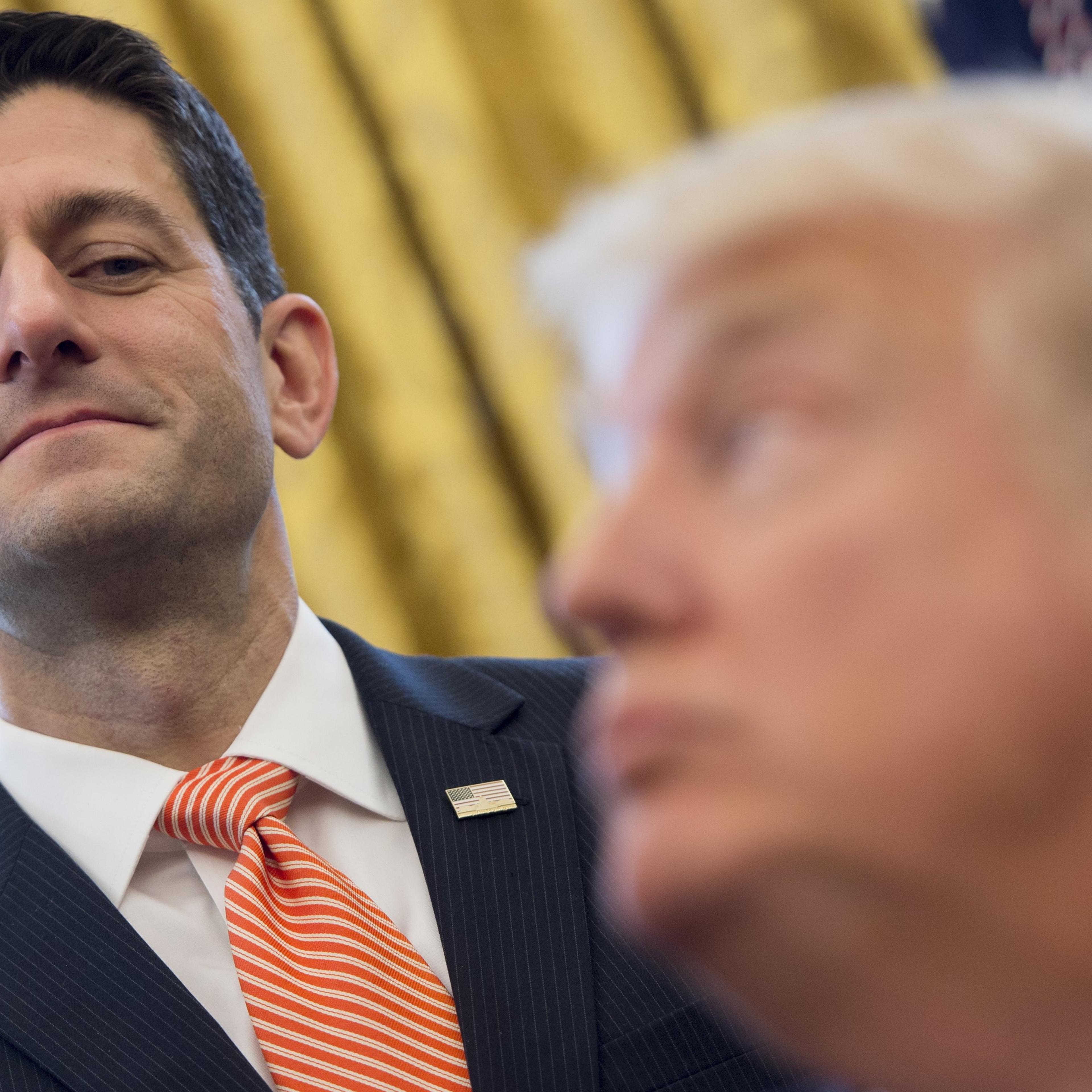 TOPSHOT-US-POLITICS-TRUMP-SIGNING