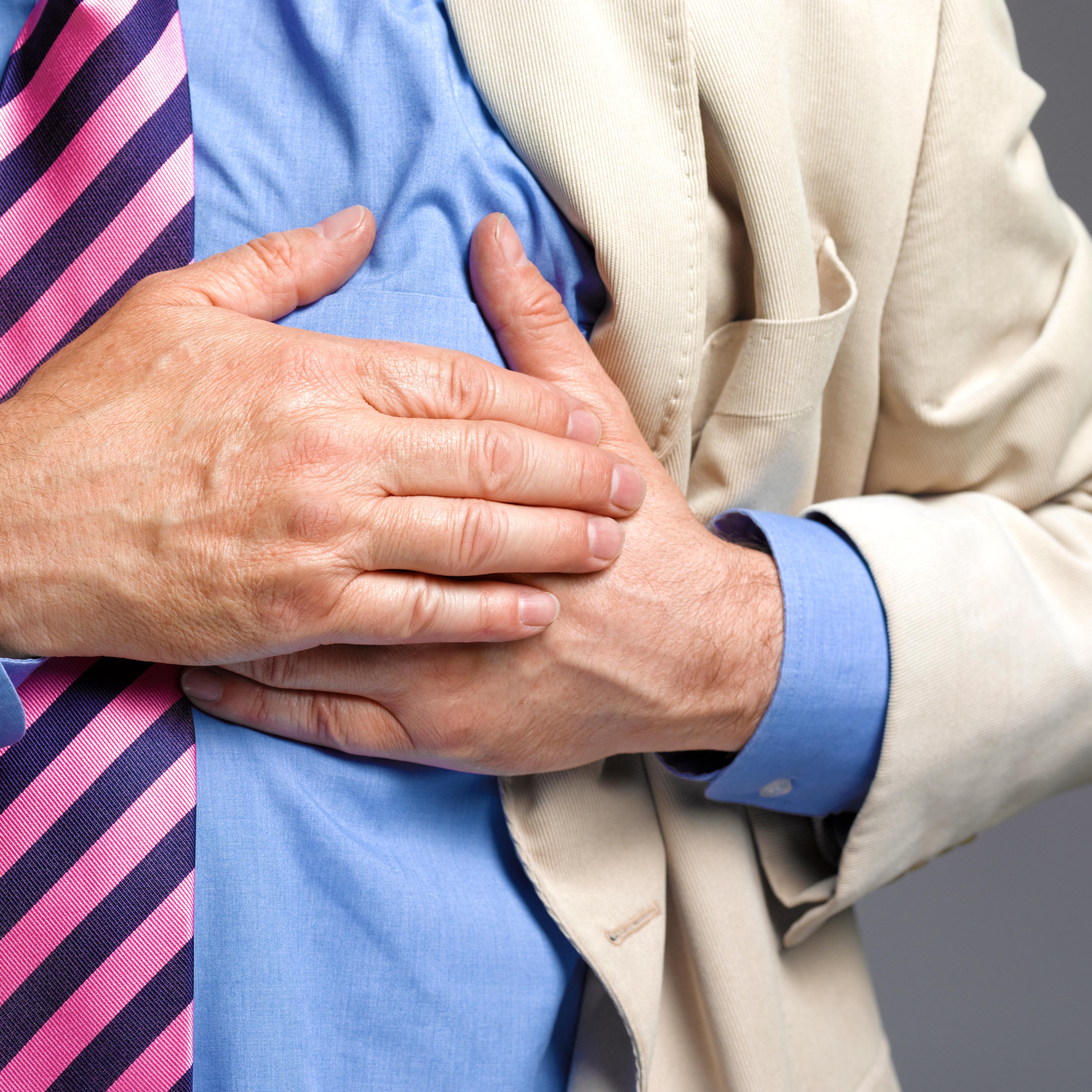 Senior man having a stroke/heart attack