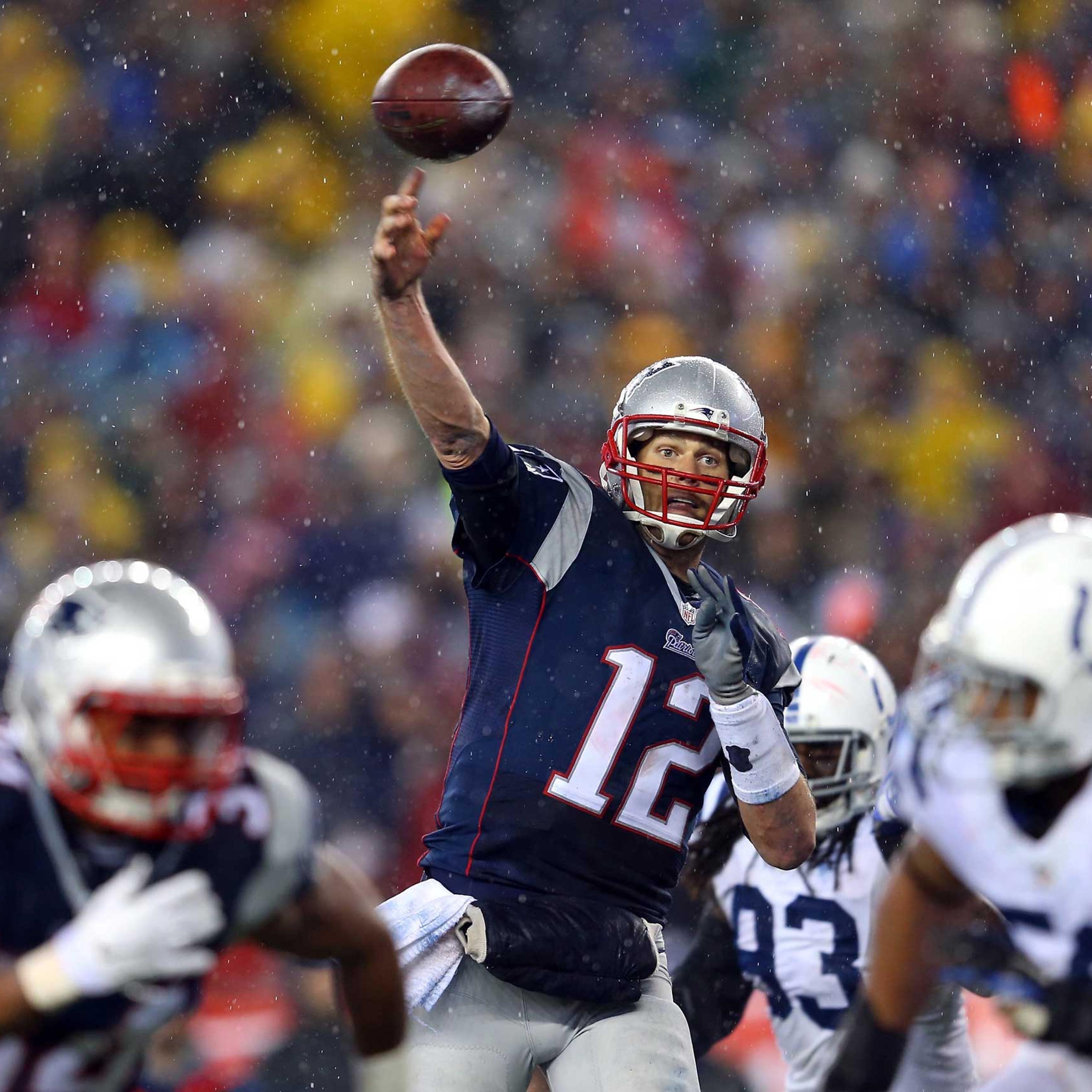 Tom Brady of the New England Patriots throws a touchdown pass against the Indianapolis Colts during the 2015 AFC Championship Game on Jan. 18, 2015 in Foxboro, Mass.