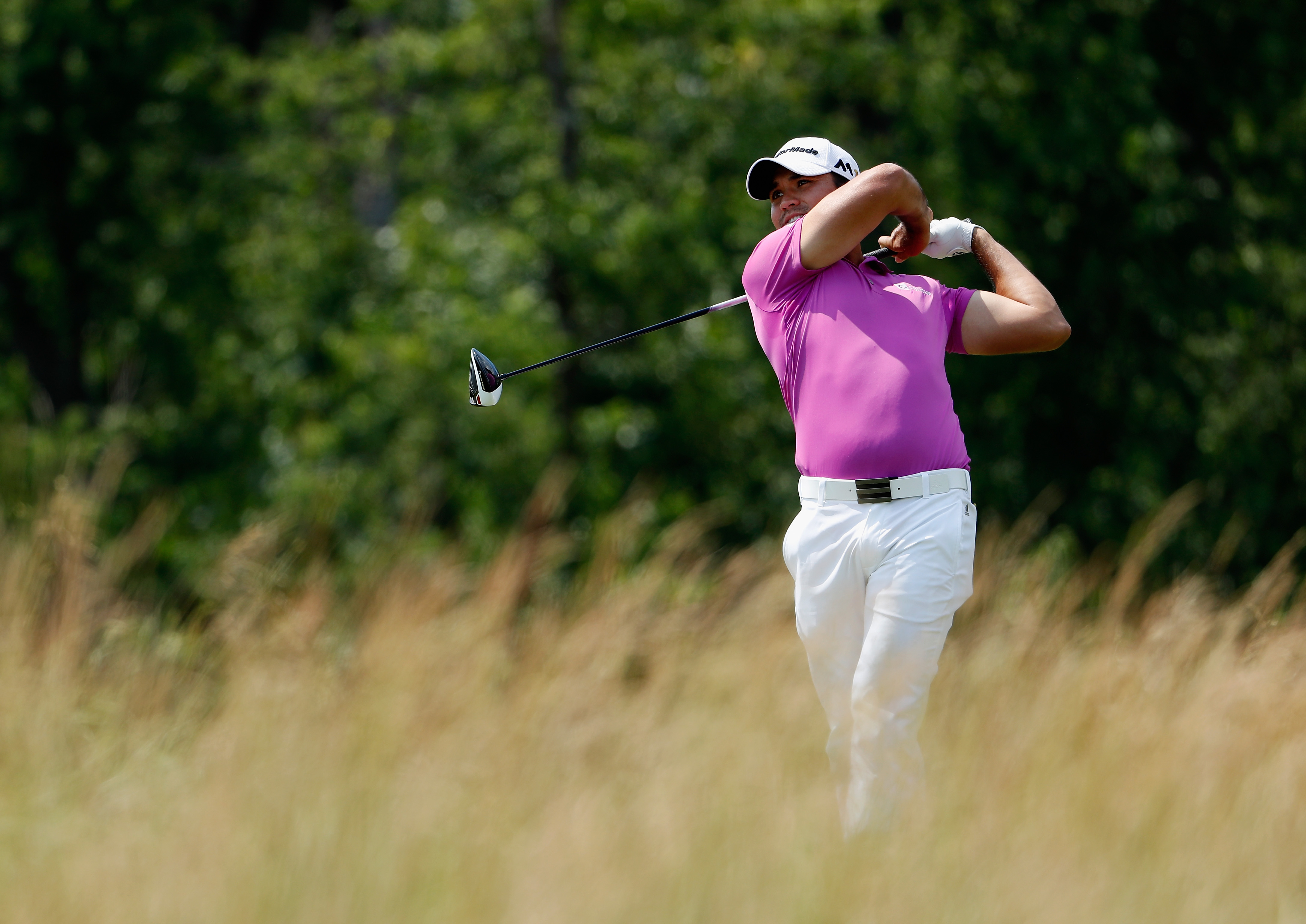 Jason Day of Australia watches his tee shot on the fourth tee during the final round of the U.S. Open at Oakmont Country Club on June 19, 2016 in Oakmont, Pennsylvania.
