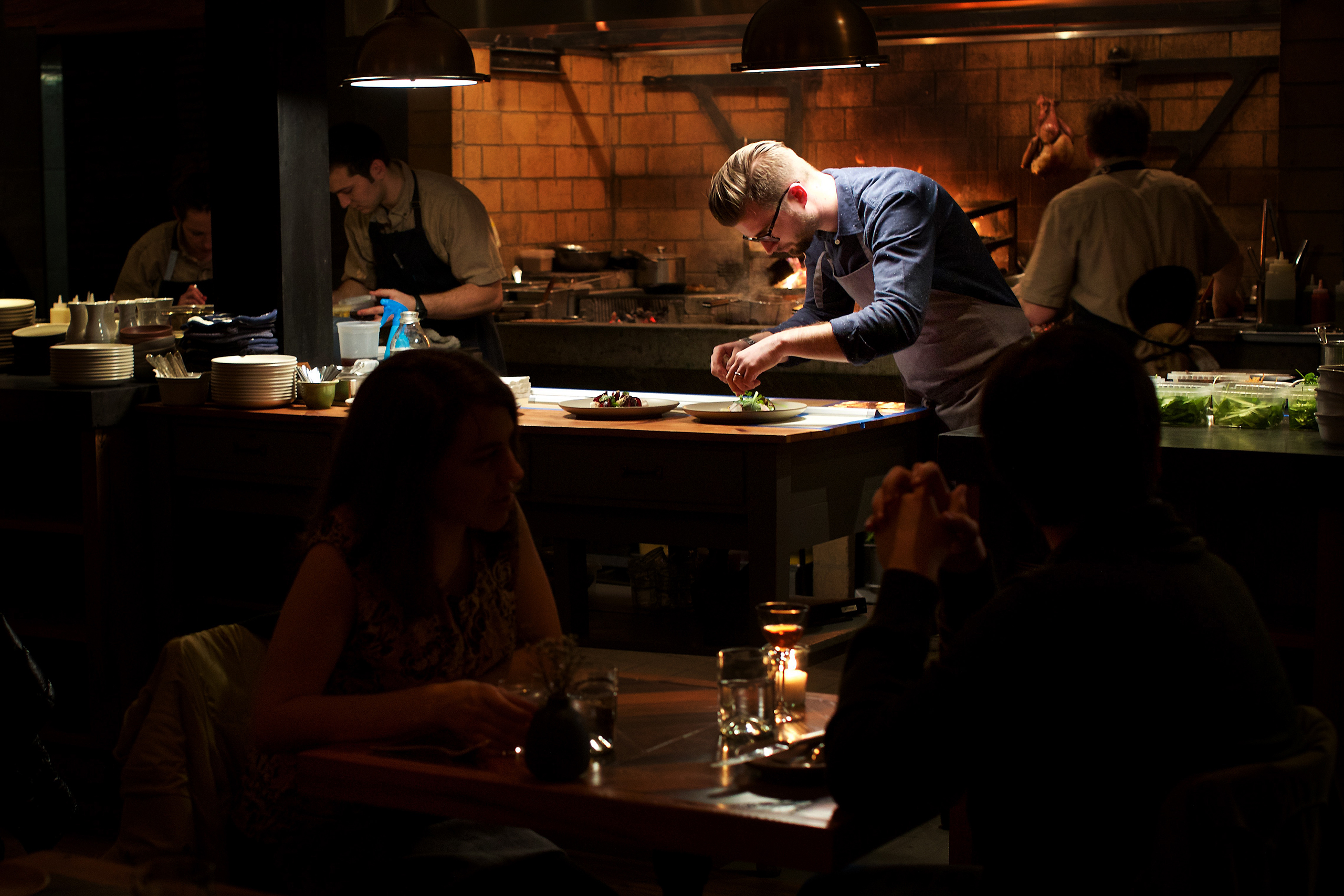 Chef Jeremiah Langhorne preps food during the dinner service at his restaurant, The Dabney, in the Shaw neighborhood in Washington, D.C.