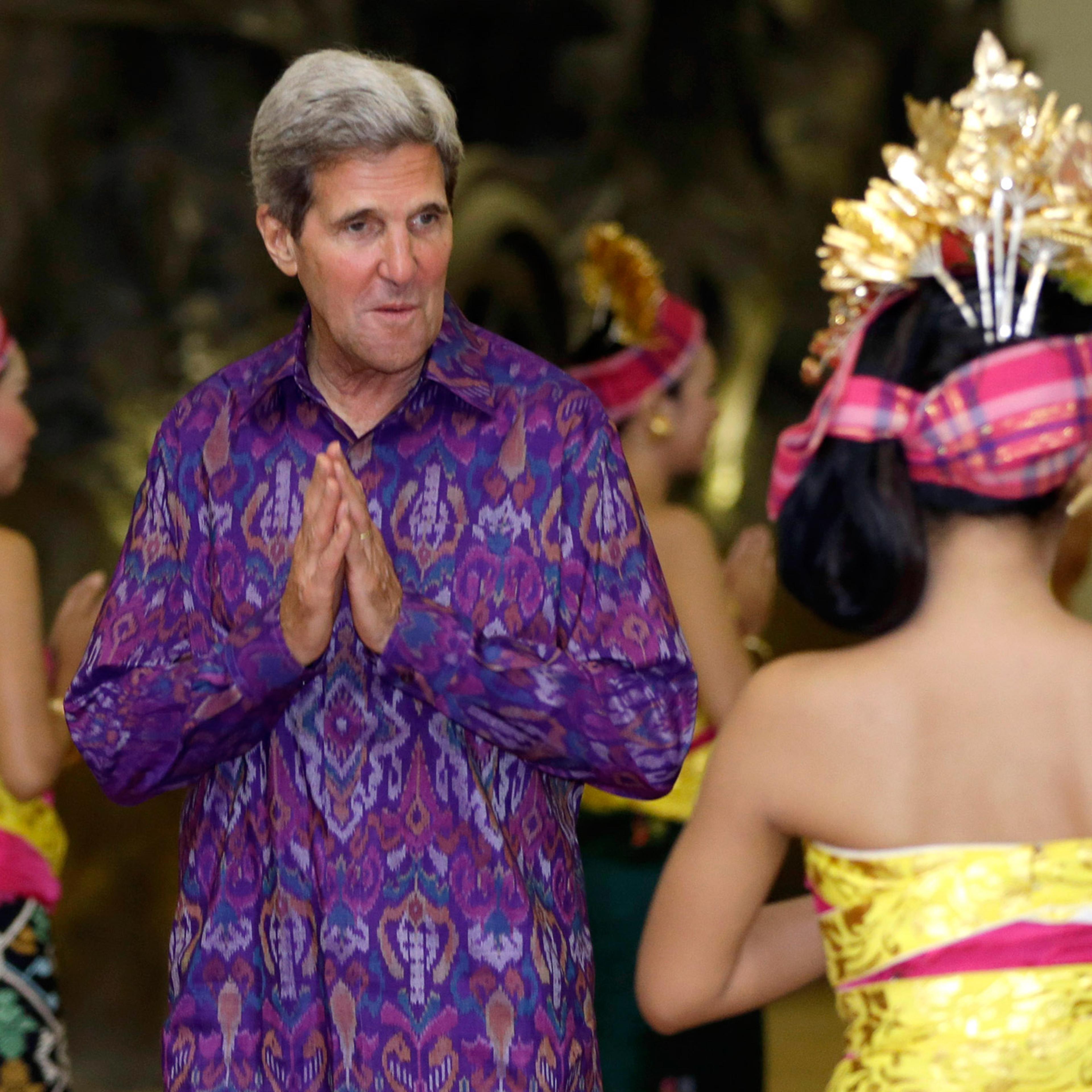 U.S. Secretary of State John Kerry, wearing a traditional Balinese woven fabric called an "endek," arrives at a gala for the leaders at the APEC Summit in Nusa Dua on the Indonesian resort island of Bali on Oct. 7, 2013.