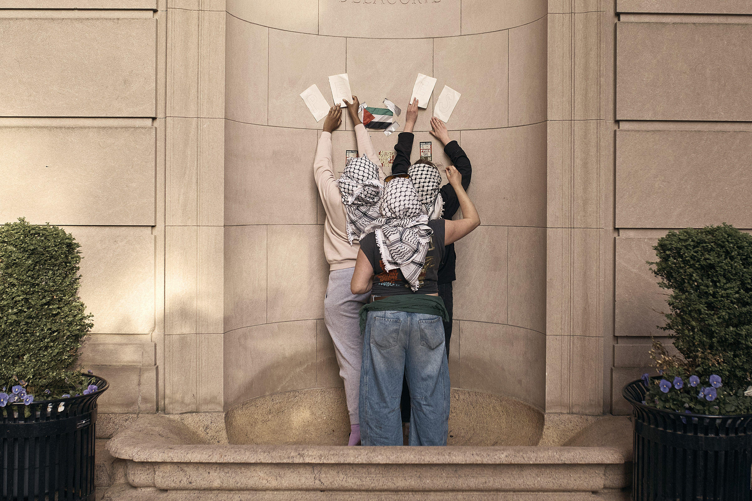 Protestors prepare during a pro-Palestinian encampment at the Columbia University in New York City, on April 30, 2024.