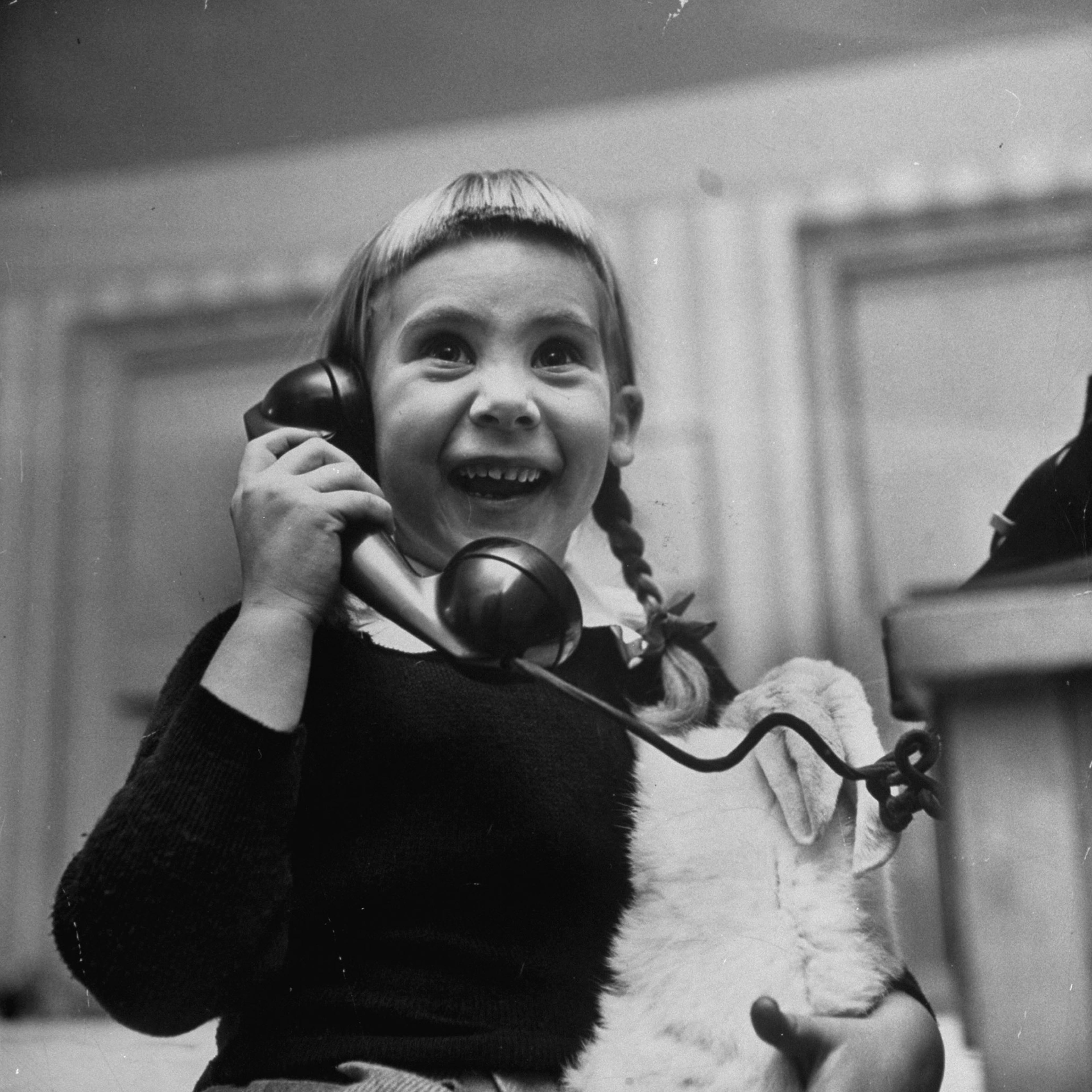 Patricia Guinan promises to leave out milk and crackers for Santa Claus on Christmas Eve, 1947.