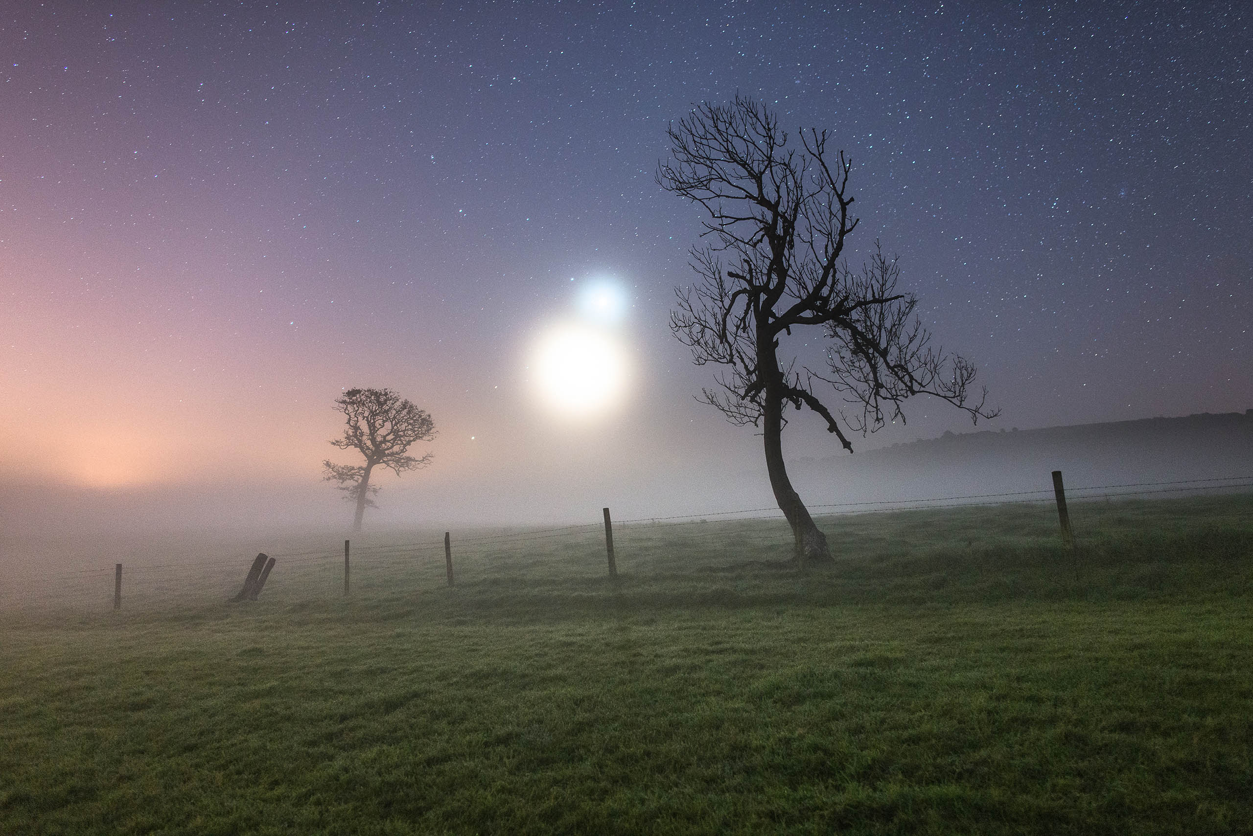 Skyscapes:Ainsley Bennet captured this image of Venus and the crescent Moon on a misty morning on the Isle of Wight in October. The image "looked like something from a science fiction movie, with Binary stars rising from the horizon of an unknown planet,