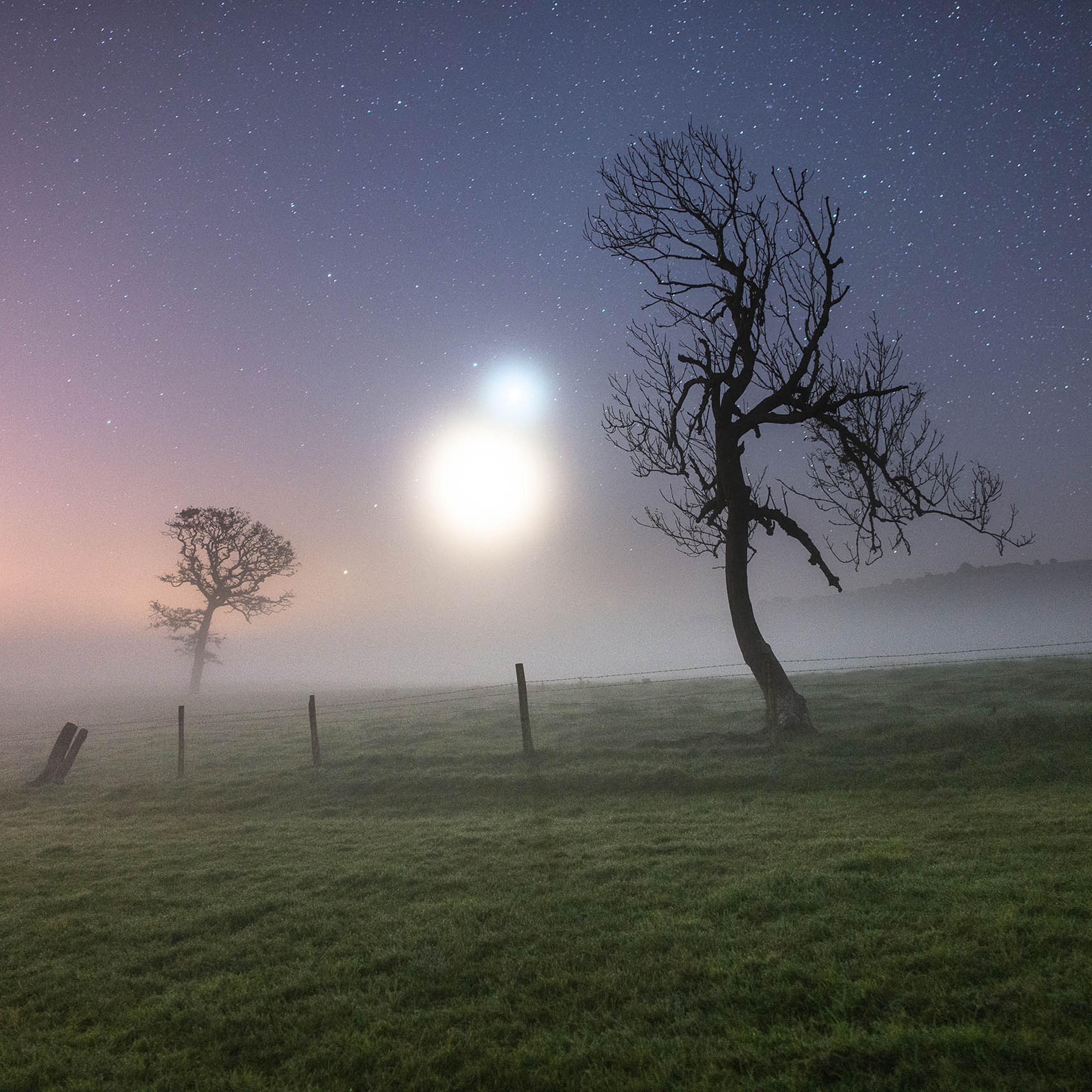 Skyscapes:Ainsley Bennet captured this image of Venus and the crescent Moon on a misty morning on the Isle of Wight in October. The image "looked like something from a science fiction movie, with Binary stars rising from the horizon of an unknown planet,