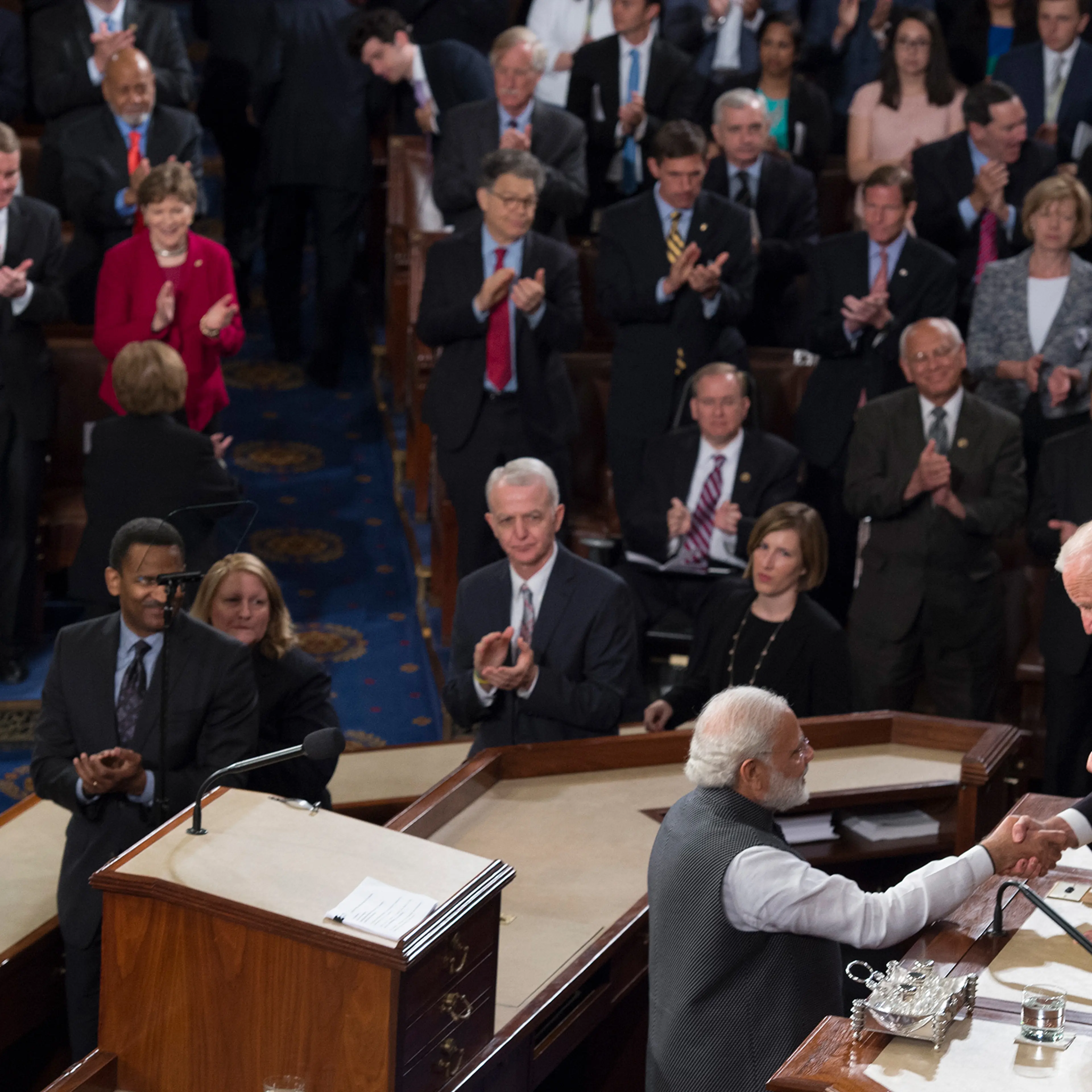 Indian Prime Minister Narendra Modi shakes Vice President Joe Biden's hand after addressing a joint session of Congress on Capitol Hill on June 8, 2016.