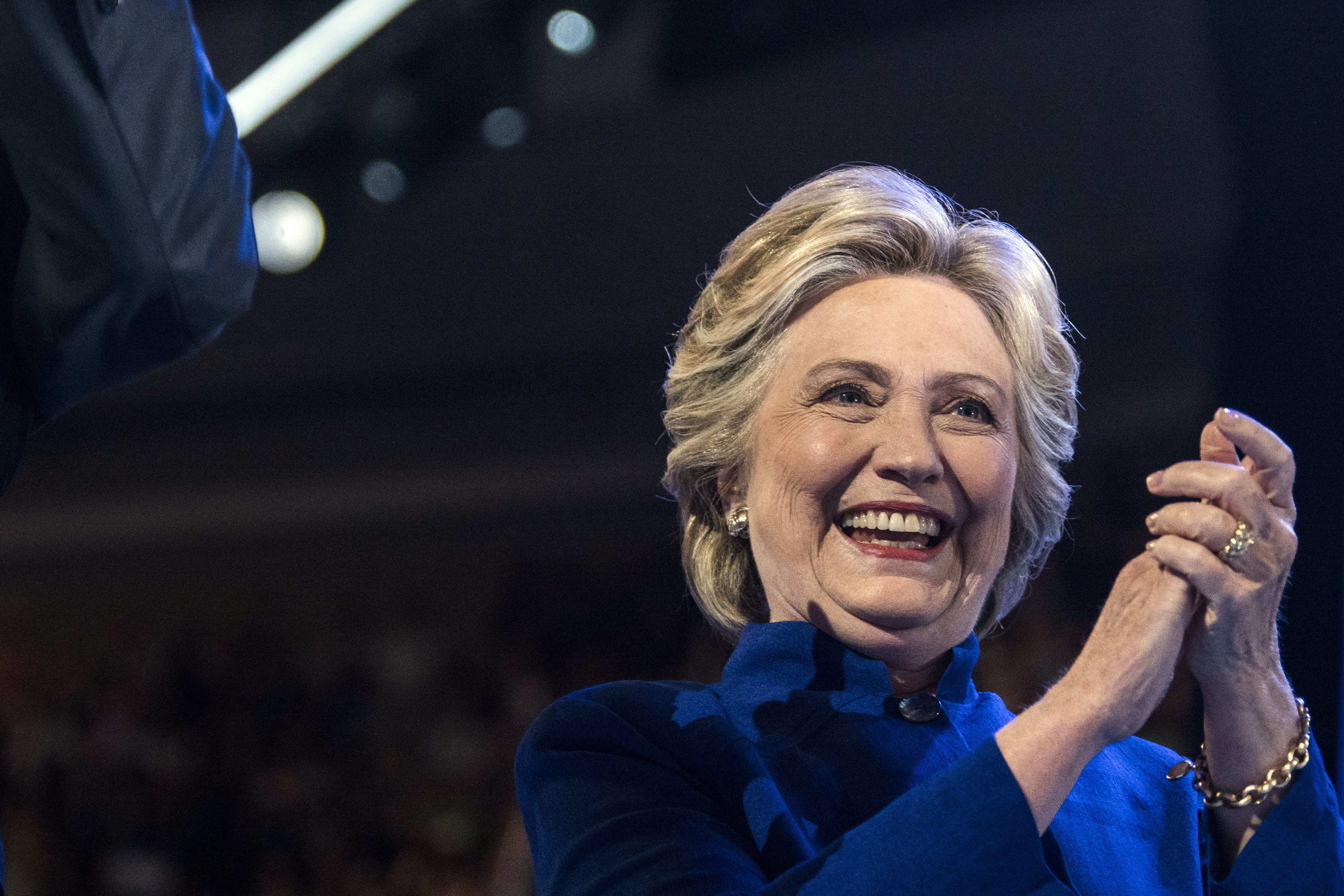 Hillary Clinton joins President Barack Obama on stage after he spoke at the Democratic National Convention in Philadelphia on July 27, 2016.