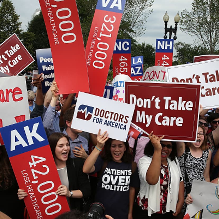 People cheer in front of the US Supreme Court after after ruliing was announced on the Affordable Care Act. June 25, 2015 in Washington, DC.