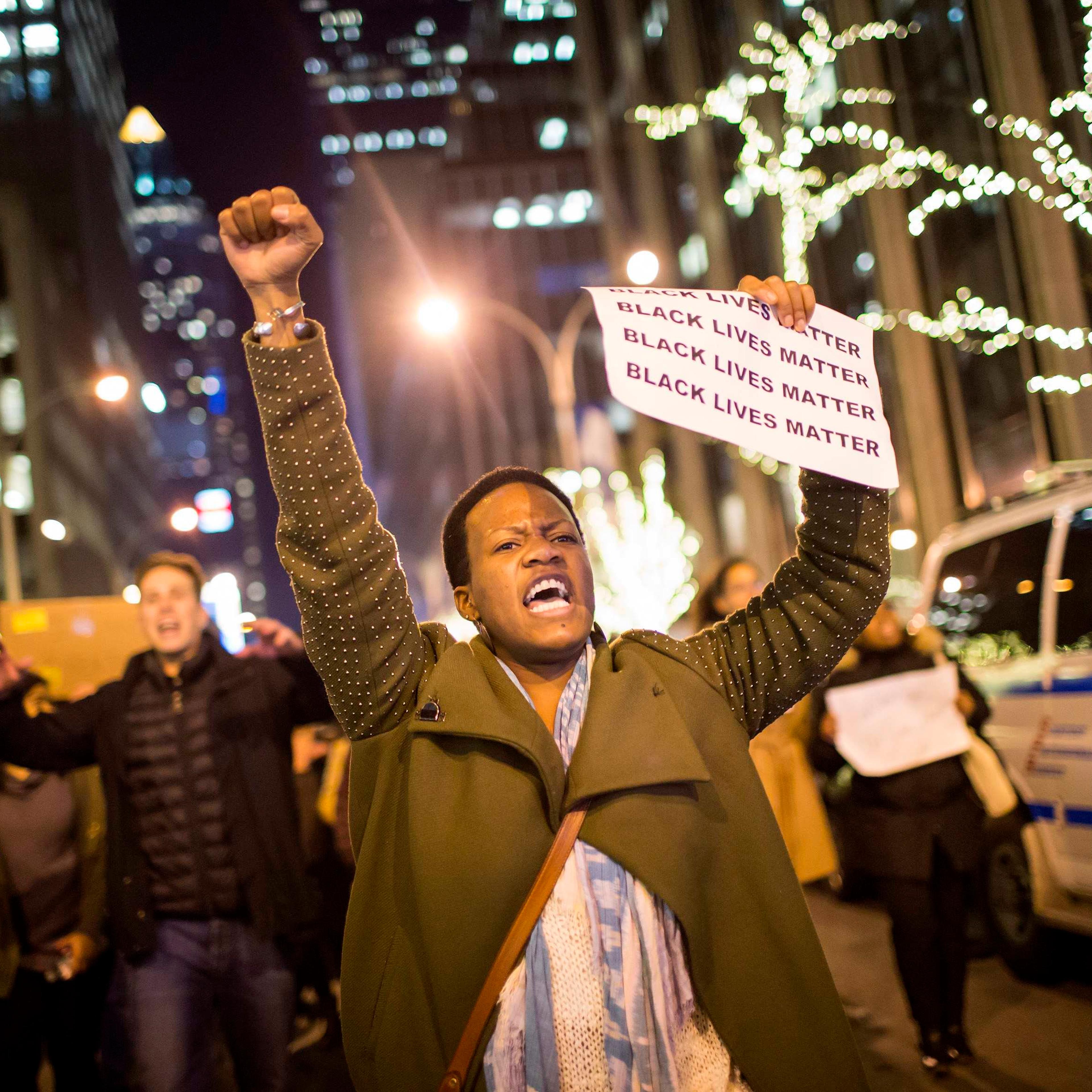 People take part in a protest against the grand jury decision on the death of Eric Garner in midtown Manhattan in New York