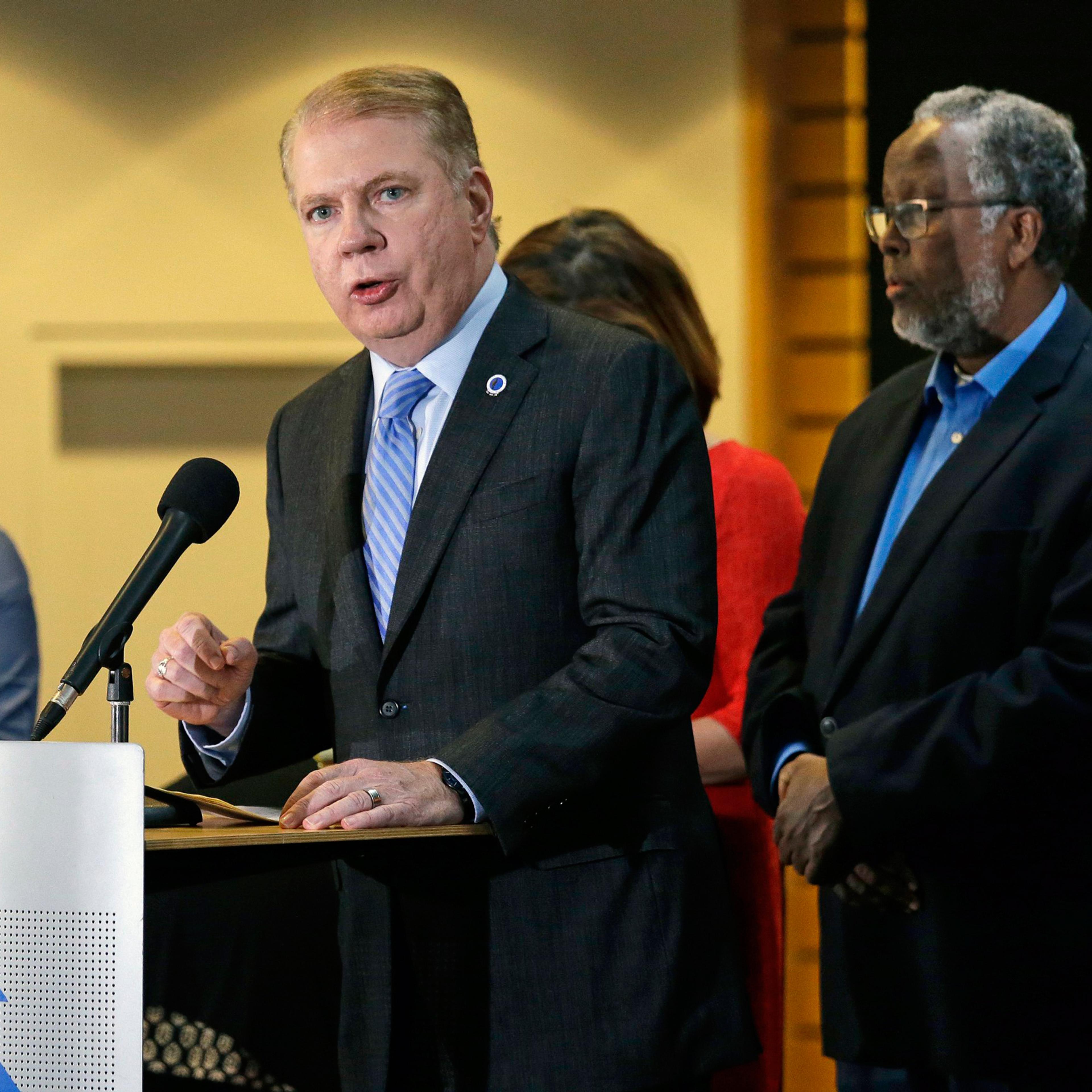 FILE - In this Nov. 9, 2016, file photo, Seattle Mayor Ed Murray, second left, speaks at a post-election event of elected officials and community leaders at City Hall in Seattle. Leaders in Seattle, San Francisco and other so-called "sanctuary cities" sa