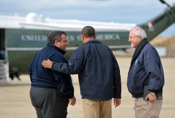 US President Barack Obama, New Jersey governor Chris Christie and FEMA (Federal Emergency Management Agency) Administrator Craig Fugate (R) walk to Marine One for an aerial tour in Atlantic City, New Jersey, on October 31, 2012 to visit areas hardest hit