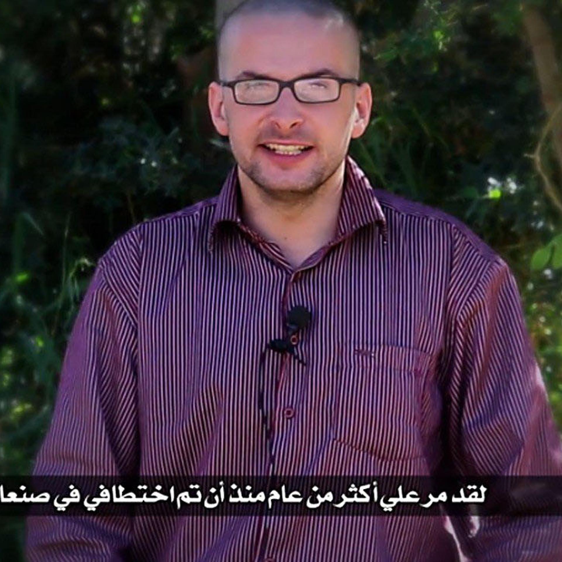A video grab taken from a propaganda video released by al-Malahem Media on Dec. 4, 2014 purportedly shows hostage Luke Somers, 33, kidnapped more than a year ago in the Yemeni capital Sanaa, calling for help and saying that his life is in danger.