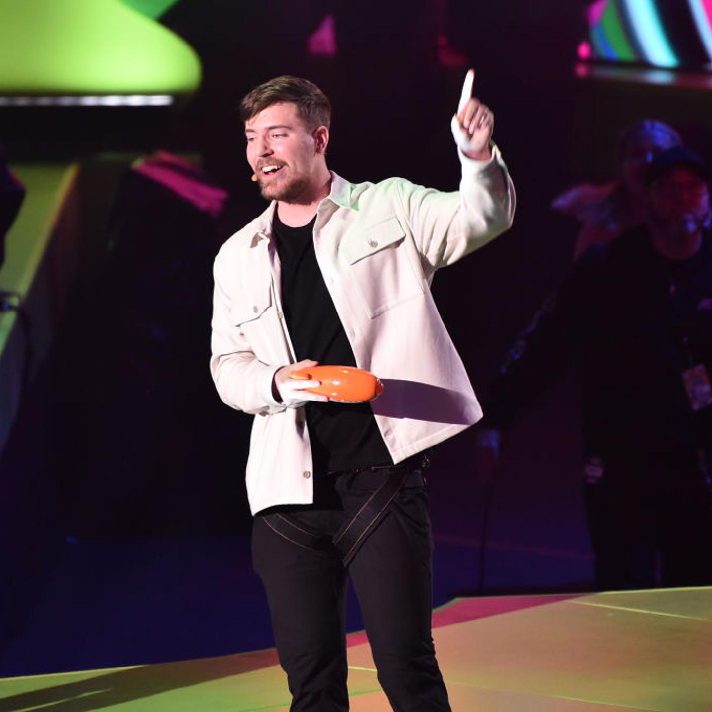 MrBeast holding a Kid's Choice Award onstage