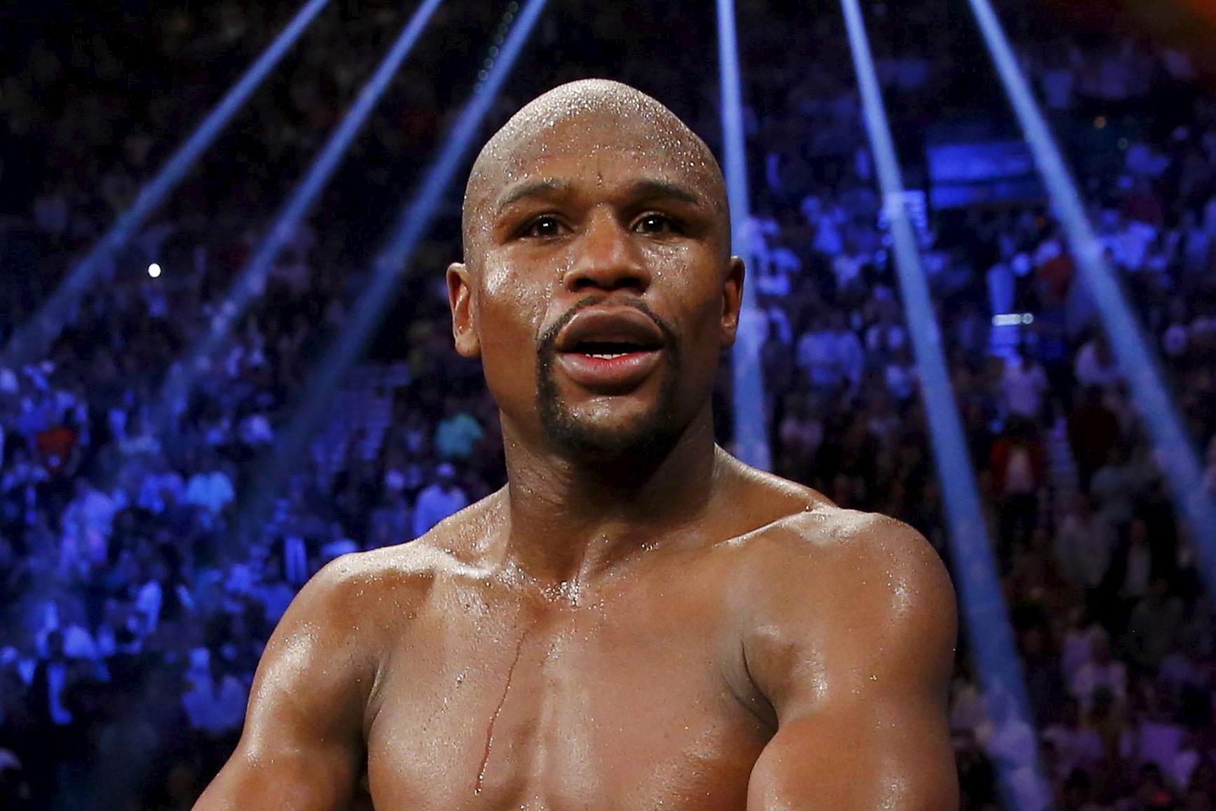 Mayweather, Jr. of the U.S. celebrates after defeating Pacquiao of the Philippines in their welterweight title fight in Las Vegas