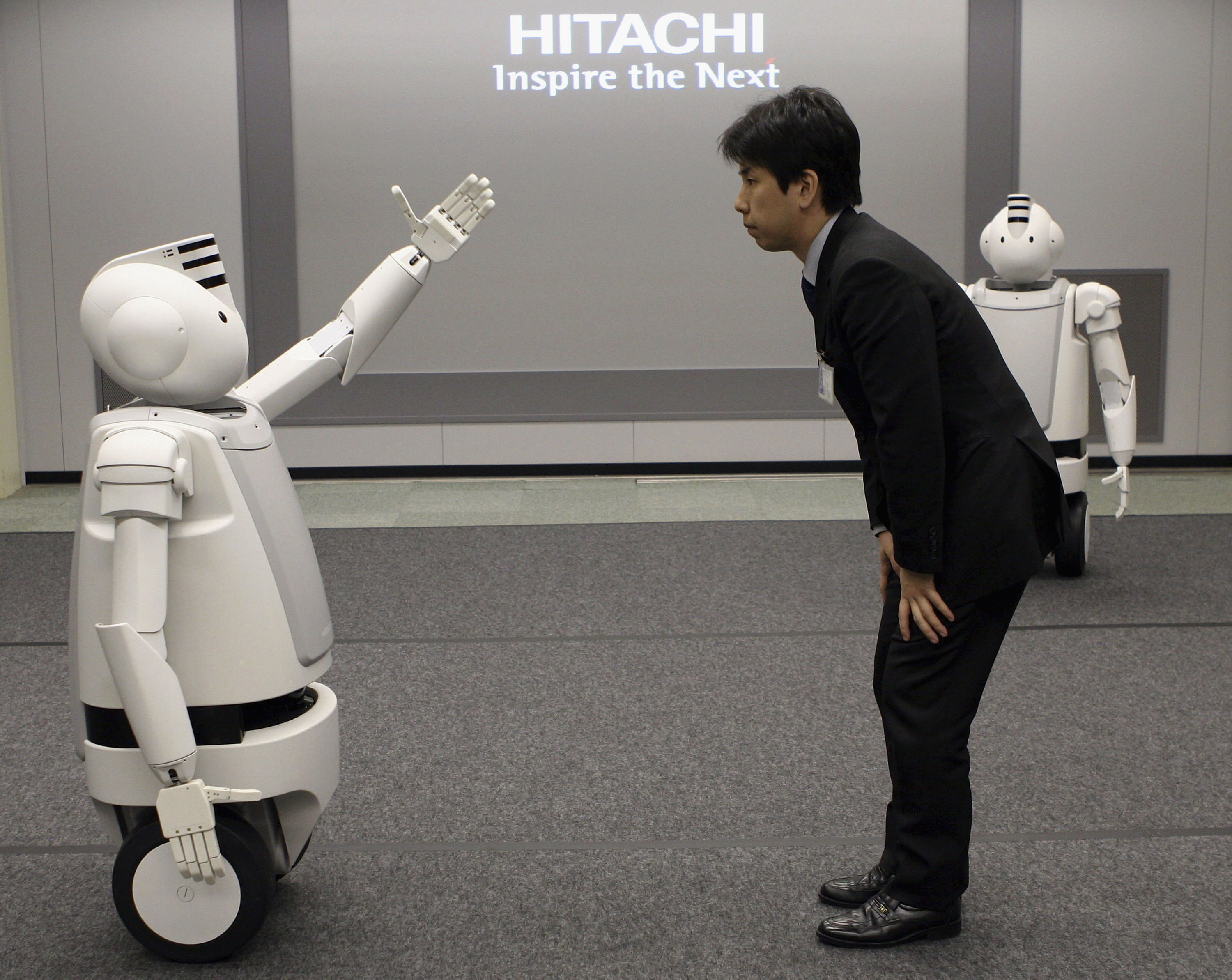 Japanese Electronics Conglomerate Hitachis New Humaniod Robot 'Emiew'