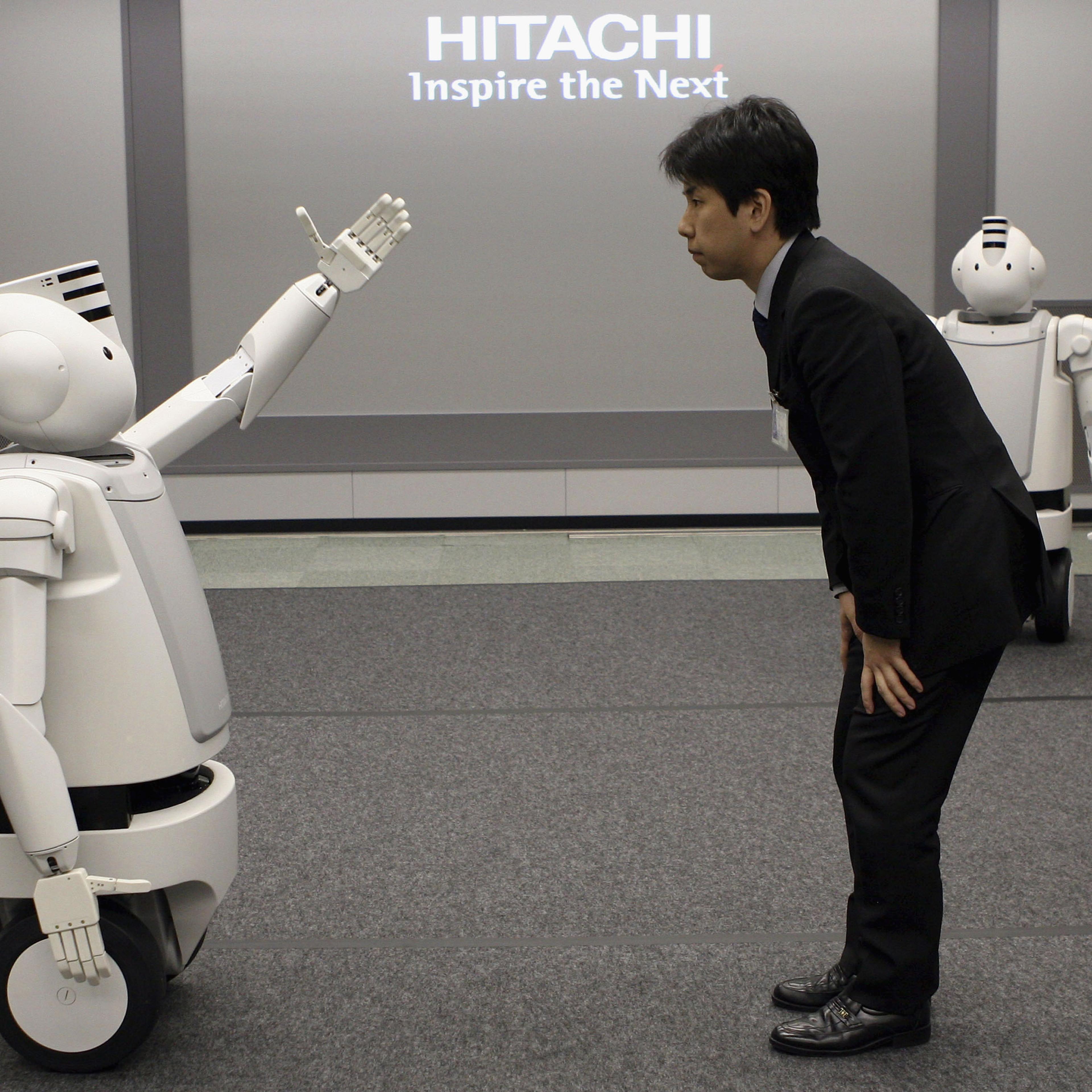 Japanese Electronics Conglomerate Hitachis New Humaniod Robot 'Emiew'