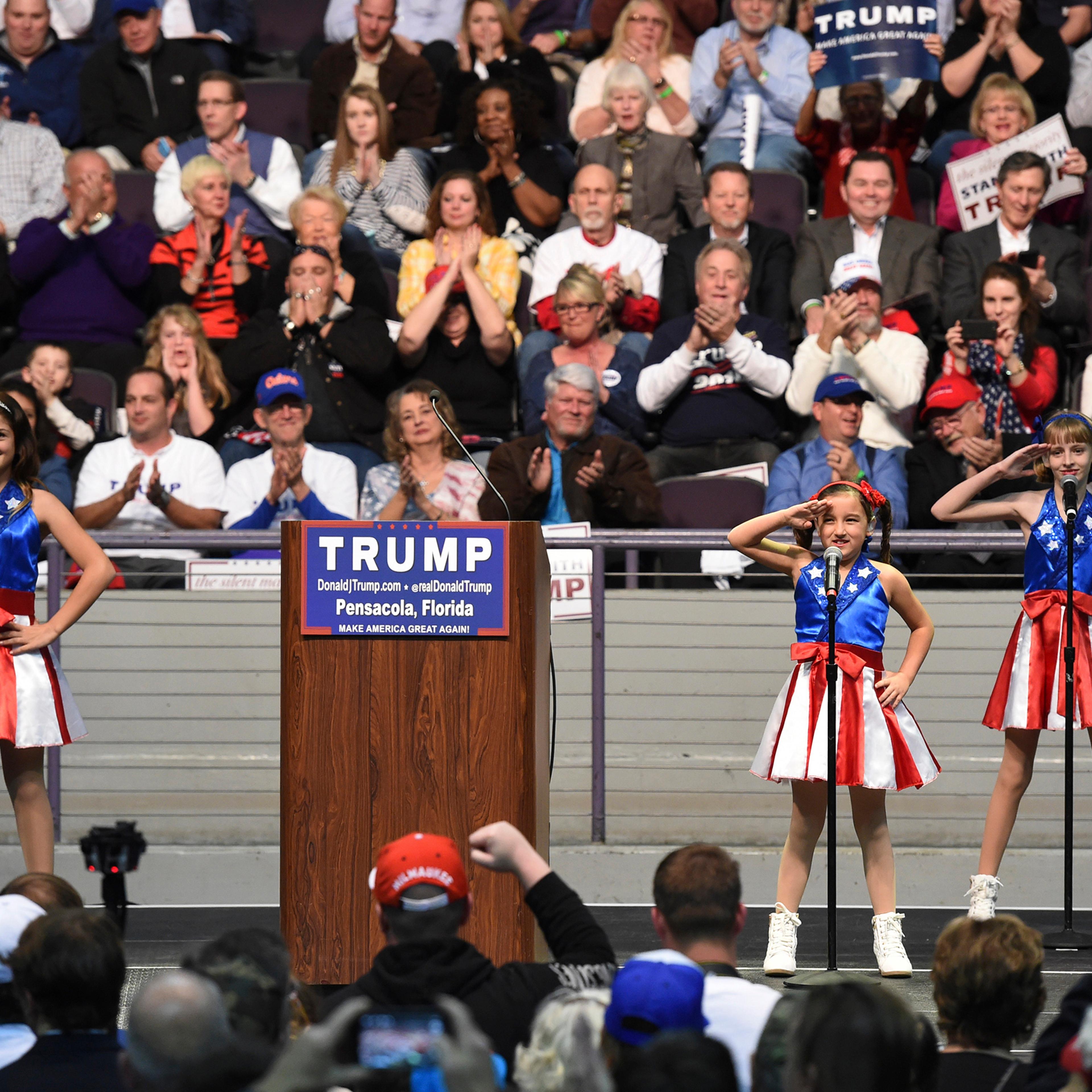 The USA Freedom Kids from Pensacola perform "Freedom's Call" during Donald Trump's campaign rally in Pensacola, Fla., Jan. 13, 2016.