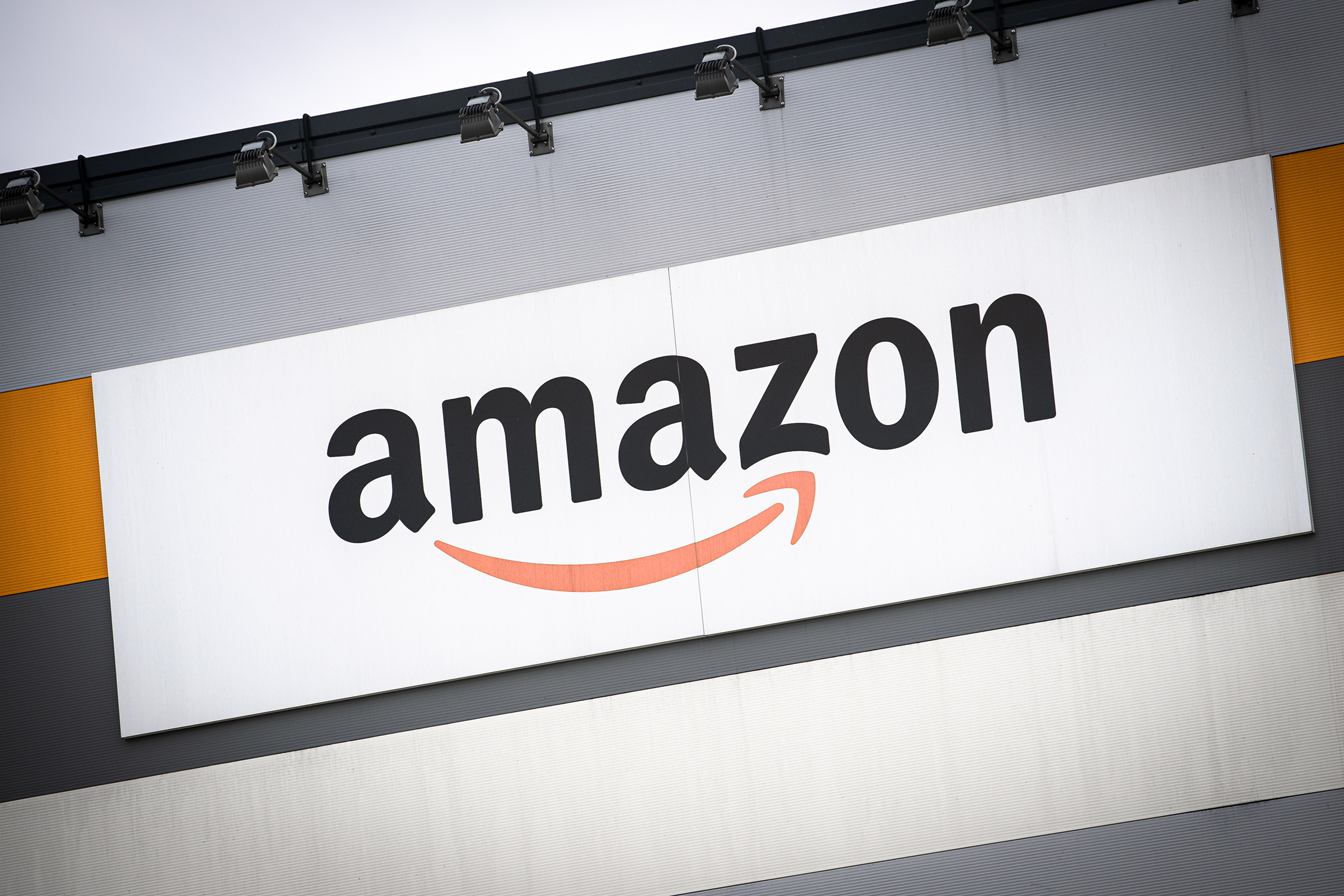 Amazon's logo is seen outside a distribution centre during a demonstration for better working conditions in front of the Amazon distribution centre in Brandizzo on March 22.