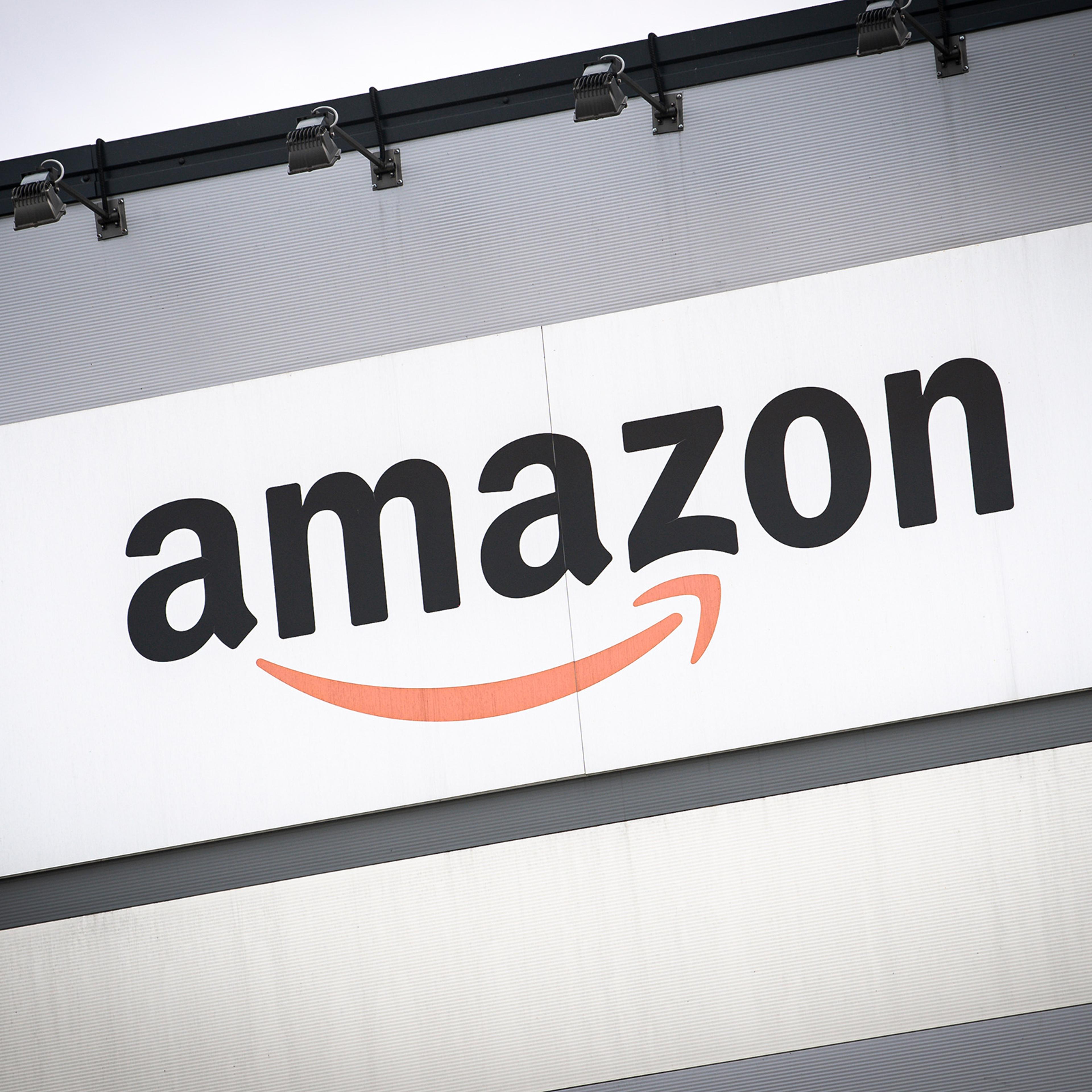 Amazon's logo is seen outside a distribution centre during a demonstration for better working conditions in front of the Amazon distribution centre in Brandizzo on March 22.