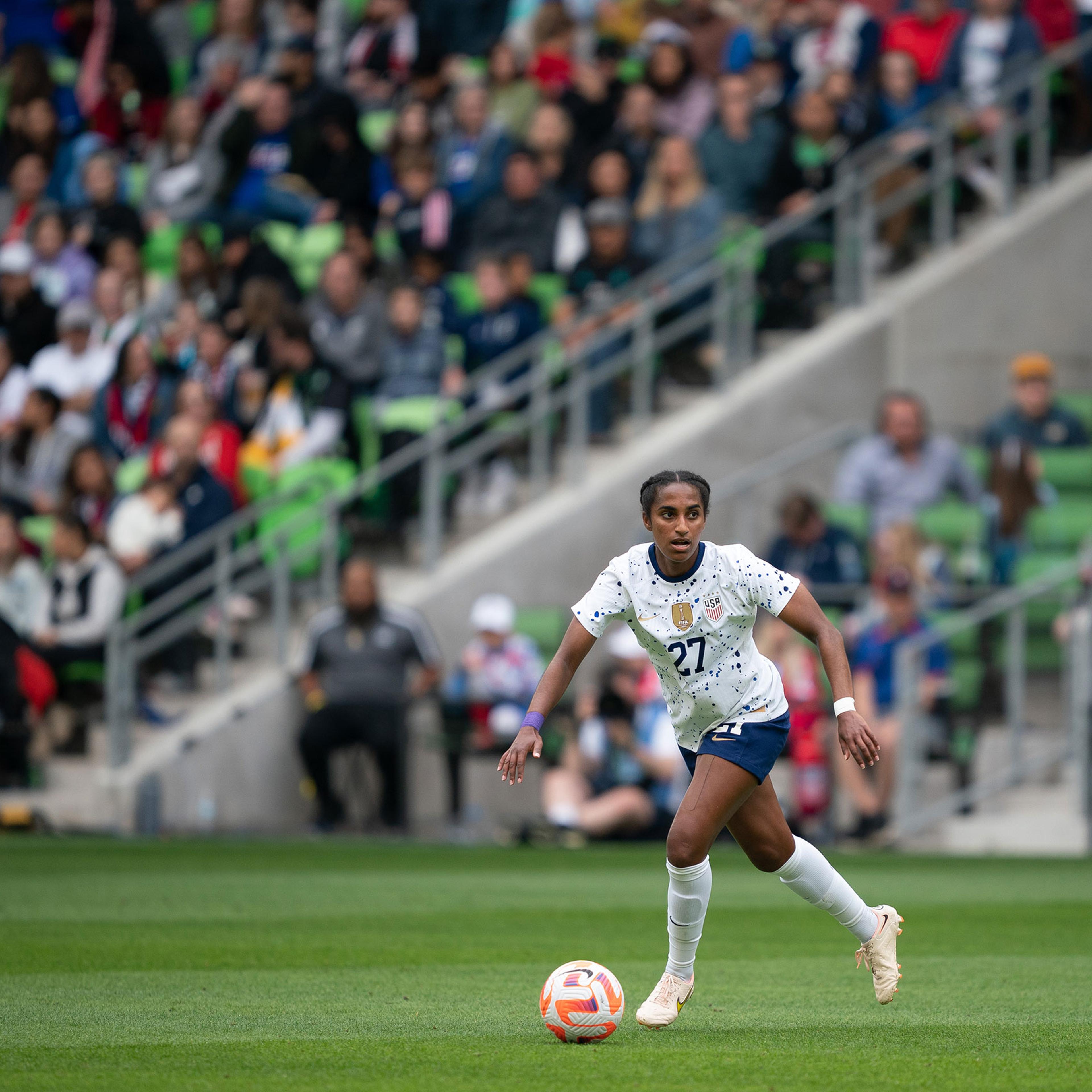 Naomi Girma #27 of the United States dribbles the ball during an international friendly game between Ireland and the USWNT at Q2 Stadium in Austin on April 8, 2023.