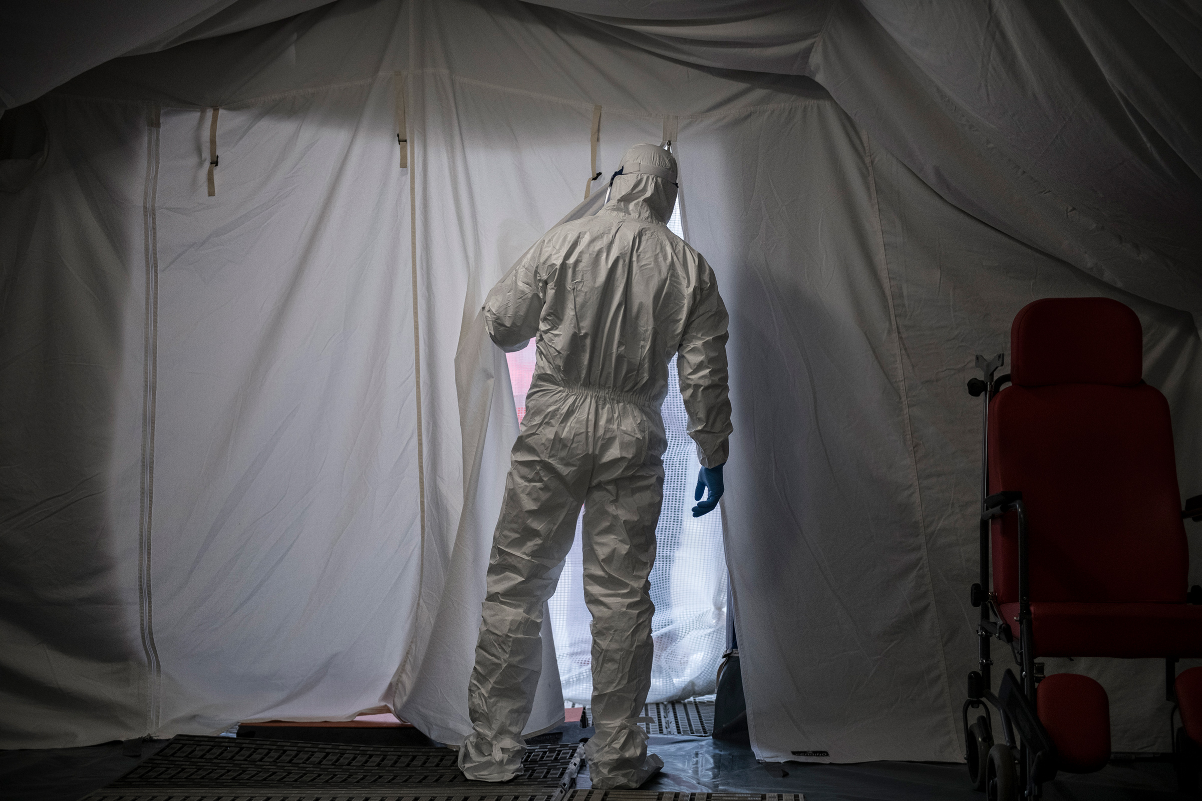 A health care worker wears protective gear at the San Giovanni Bosco Hospital in Turin, Italy, on Feb. 27