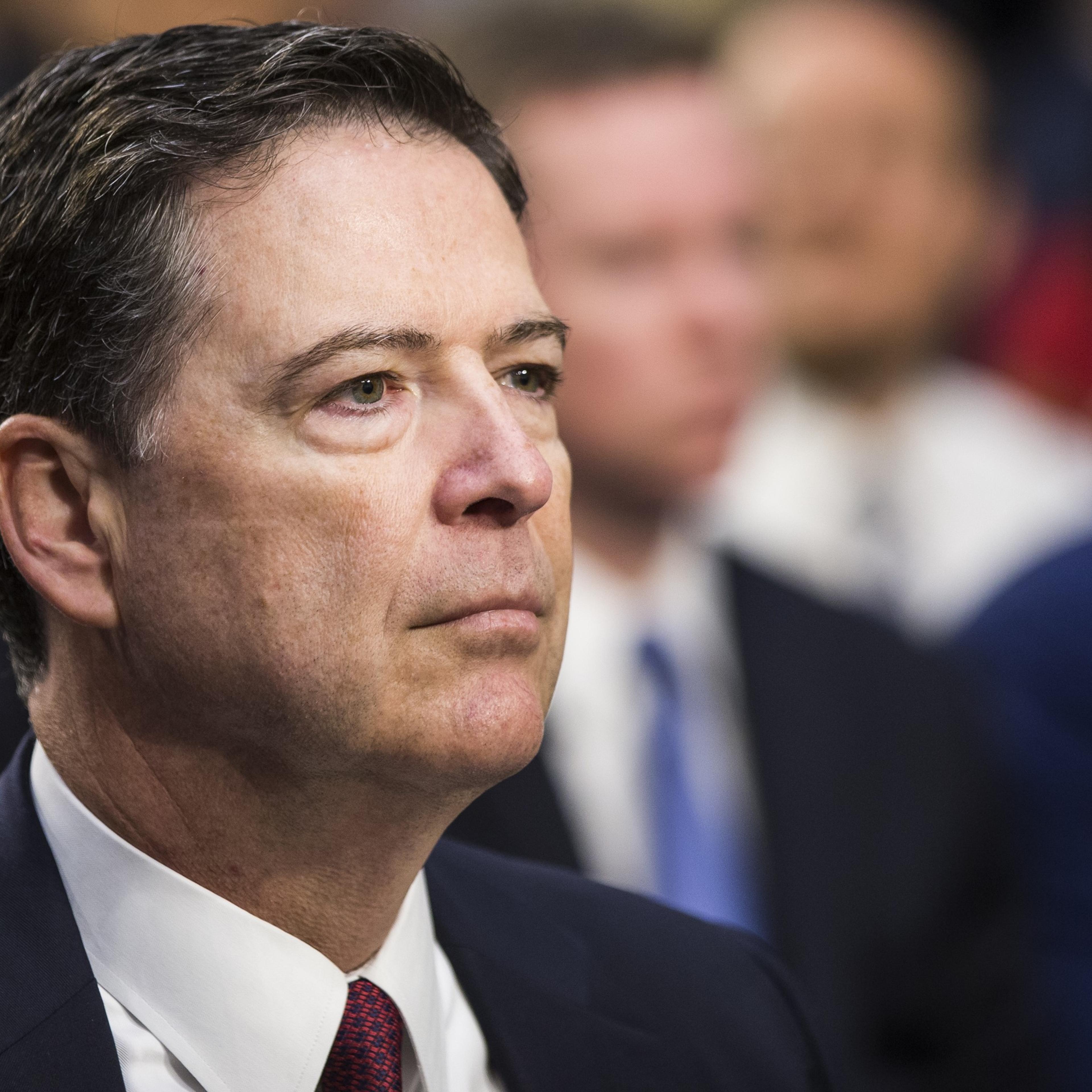 Former FBI Director James Comey testifies before Congress