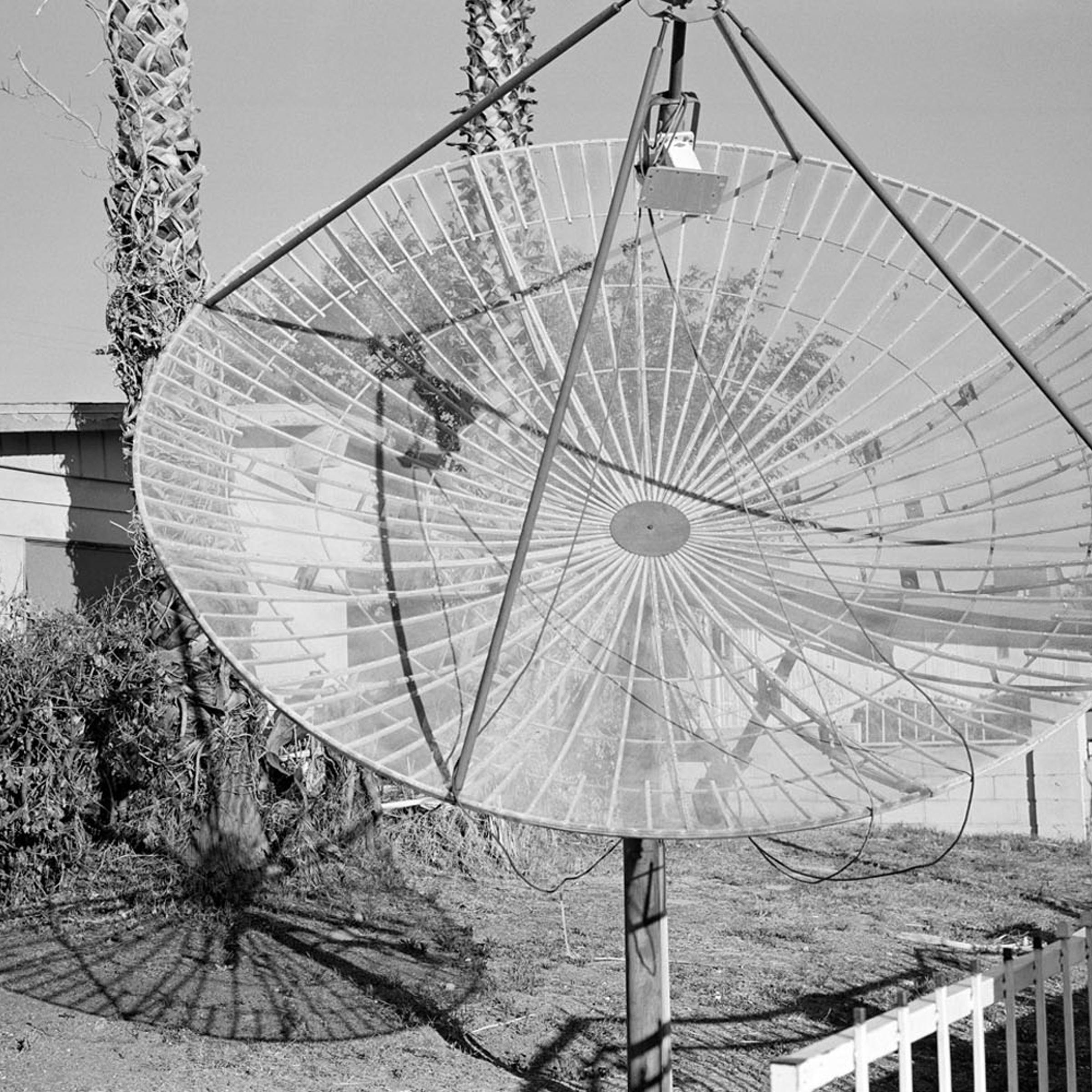 USA. Las Vegas, Nevada. November, 2011. Satellite dish in front of a foreclosed house.