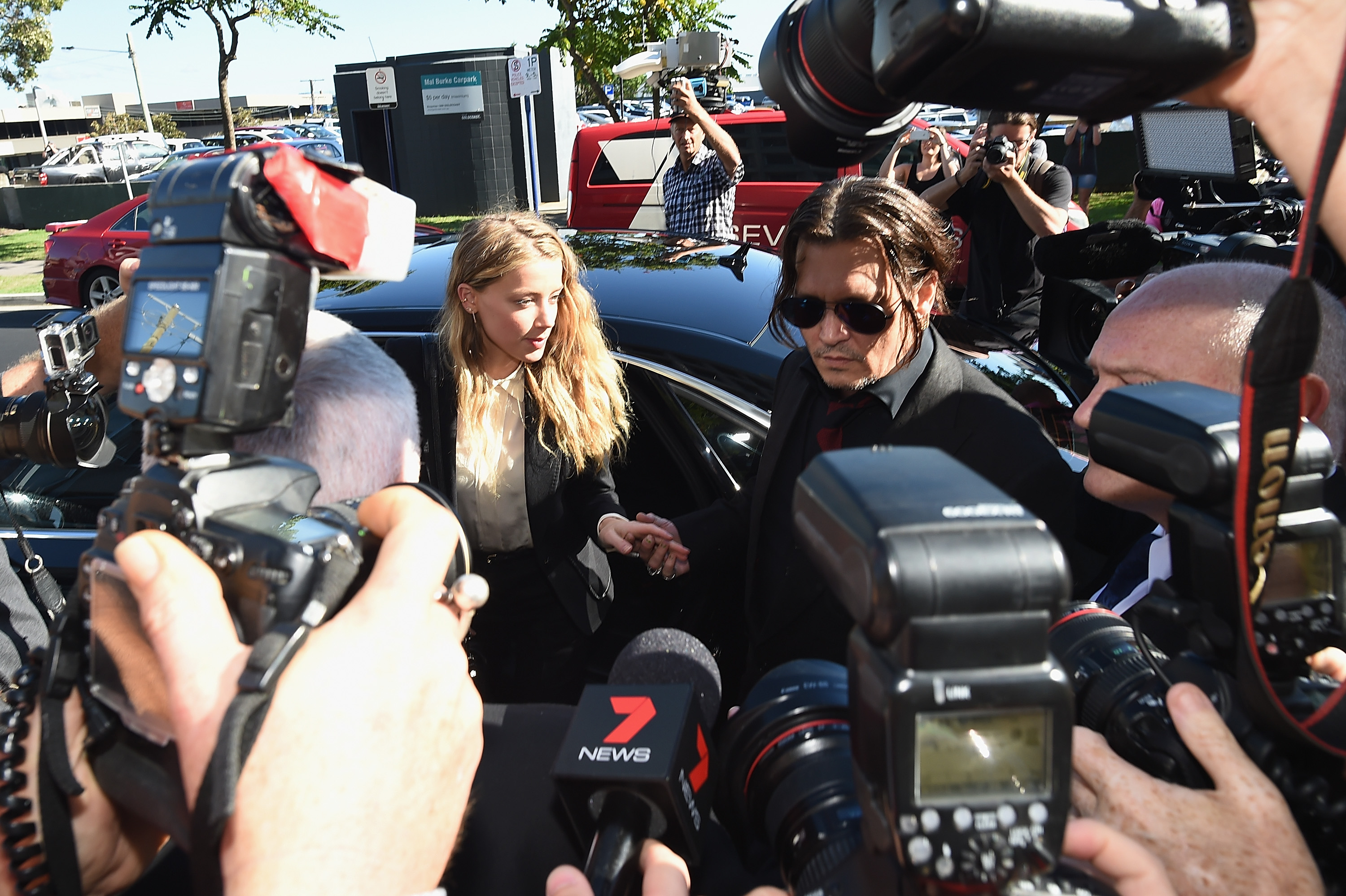 Amber Heard Faces Trial In Gold Coast Court For Smuggling Johnny Depp's Dogs Into Australia