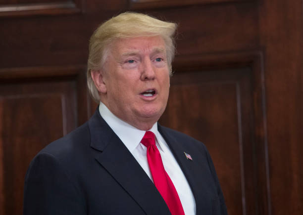 U.S. President Donald J. Trump answers a reporter's question on January 29, 2018 at the White House.