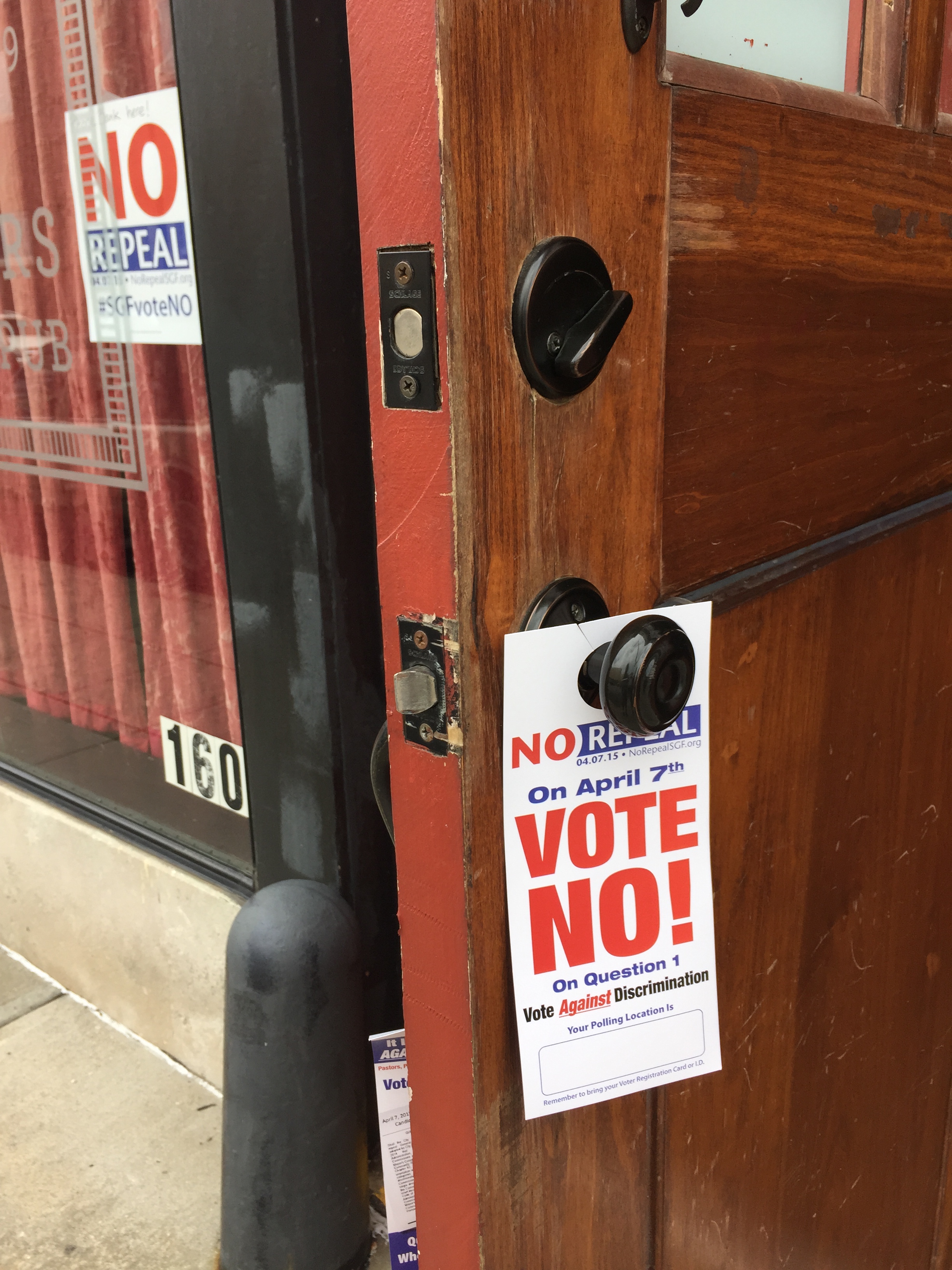 Signs hung at a business in Springfield, Mo., express support for upholding a local non-discrimination measure for LGBT residents, which was repealed on April 7, 2015. 