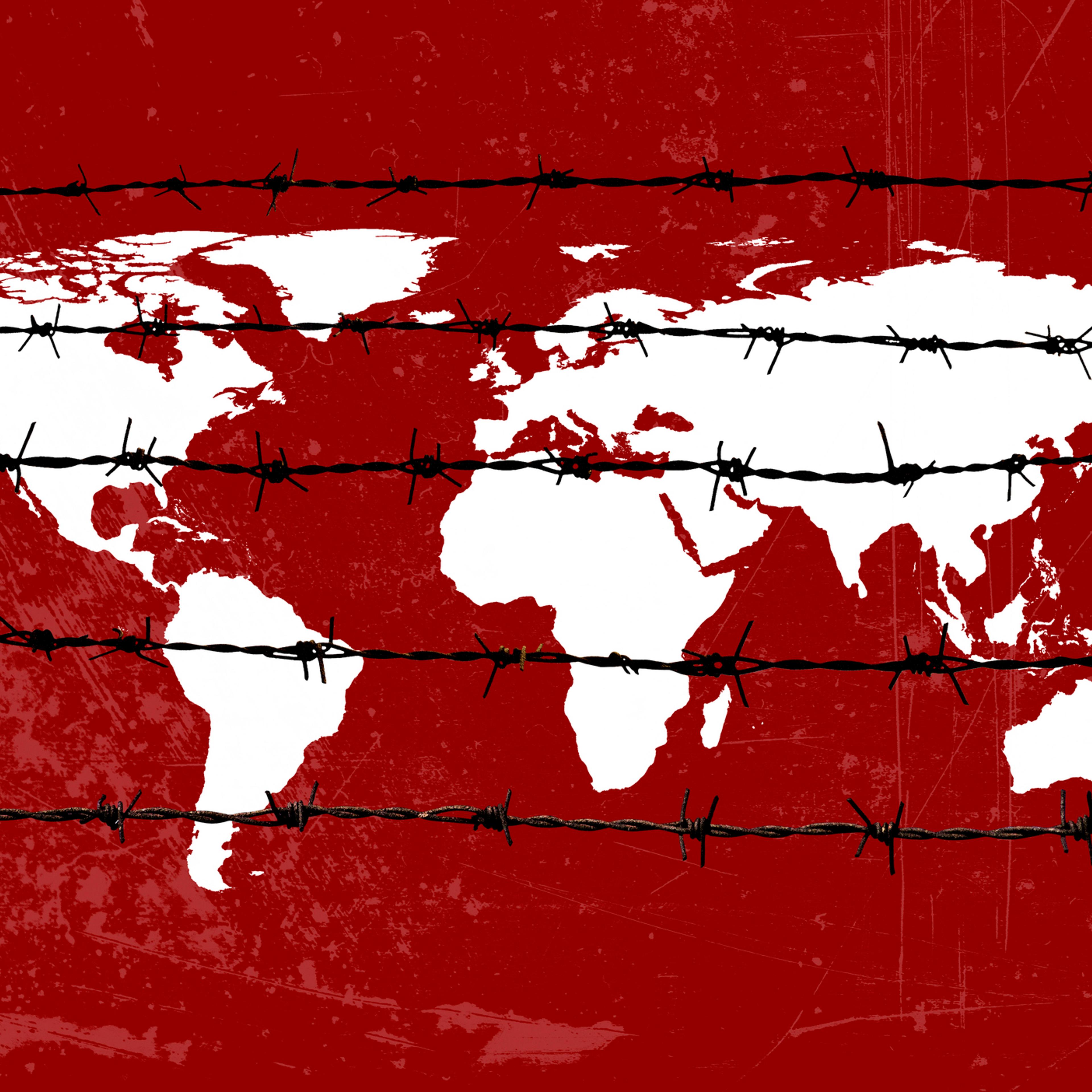 World map with barbed wire